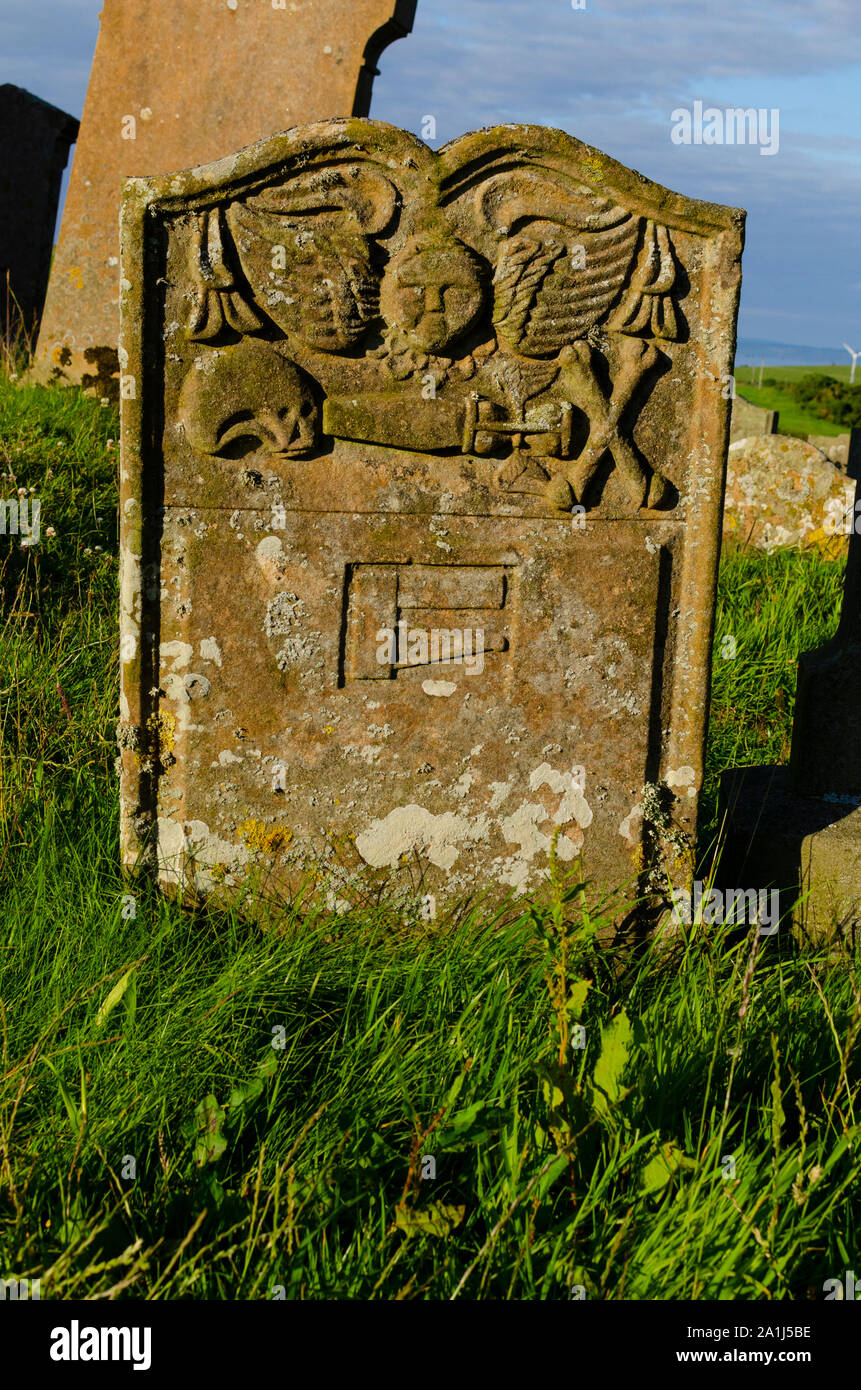 Ancient headstone on a grave at Kirkmadrine Burial Chapel Mull of Galloway Dumfries and Galloway Scotland UK Stock Photo