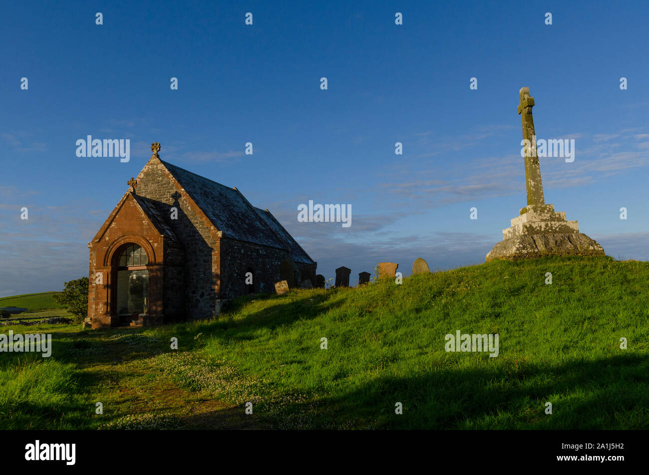 The Kirkmadrine Stones include three of the oldest Christian relics in Scotland reside in this burial chapel at Kirkmadrine Mull of Galloway Scotland Stock Photo