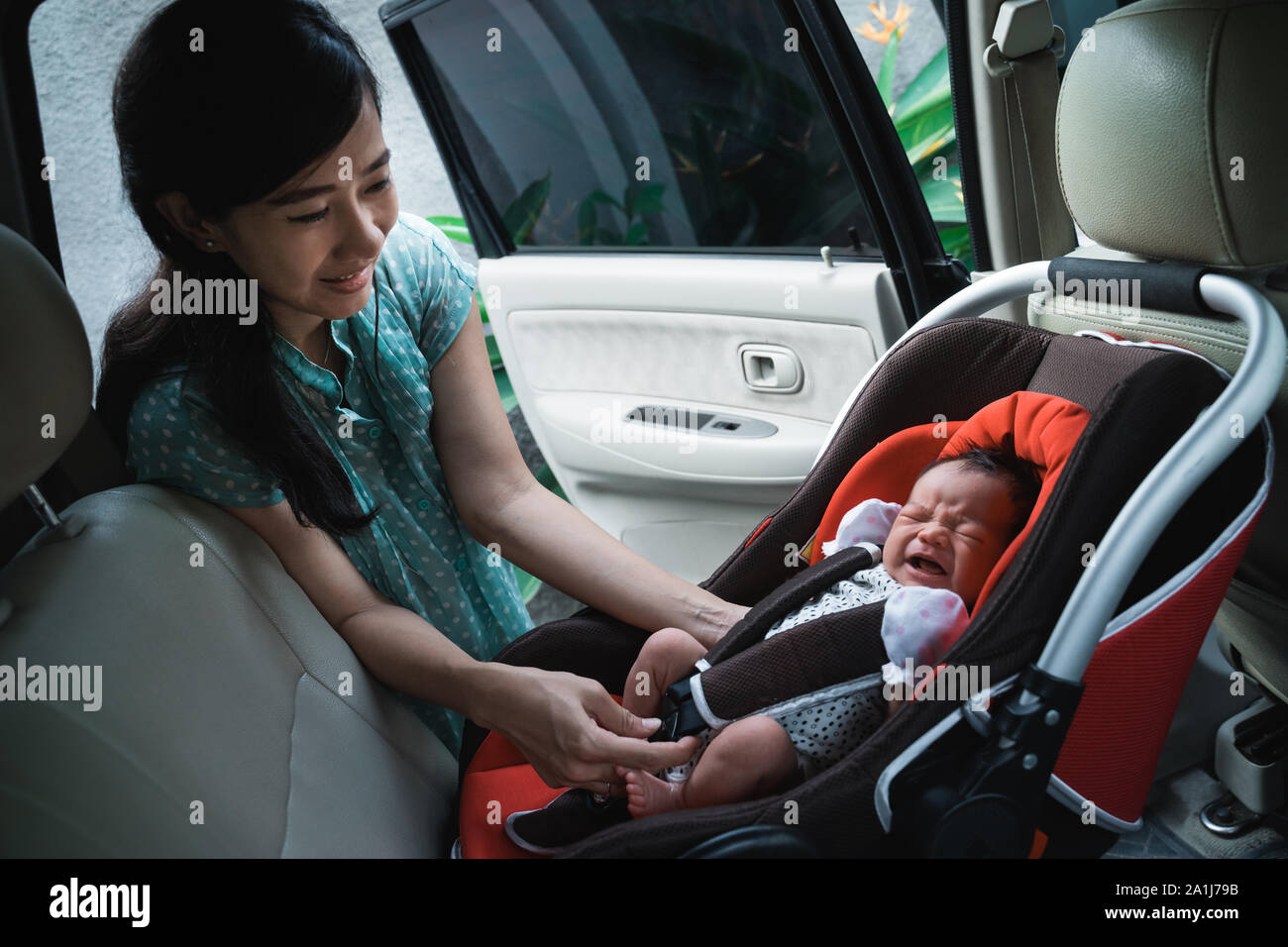 crying baby travel high resolution stock photography and images alamy