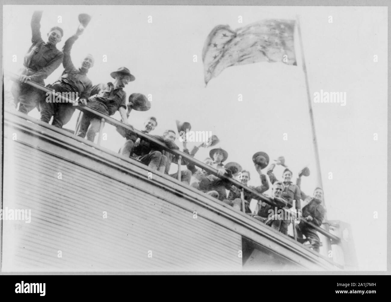 N.Y. National Guard training and maneuvers at Fishkill and Peekskill, N.Y.: Men waving from railing of ferry enroute to Fishkill Stock Photo