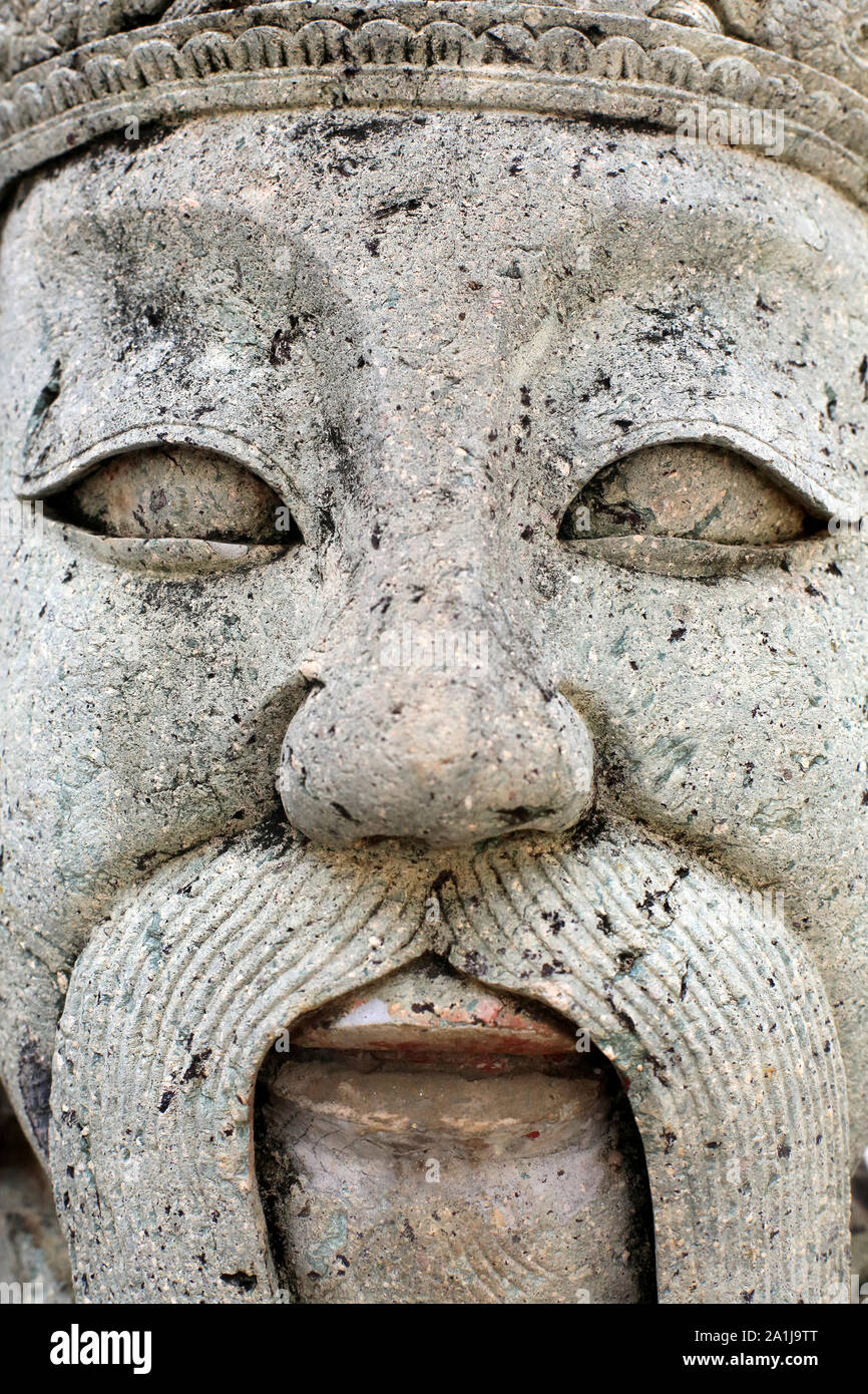 Chinese stone guardian sculpture. Wat Pho - Wat Phra Chettuphon. Bangkok. Stock Photo