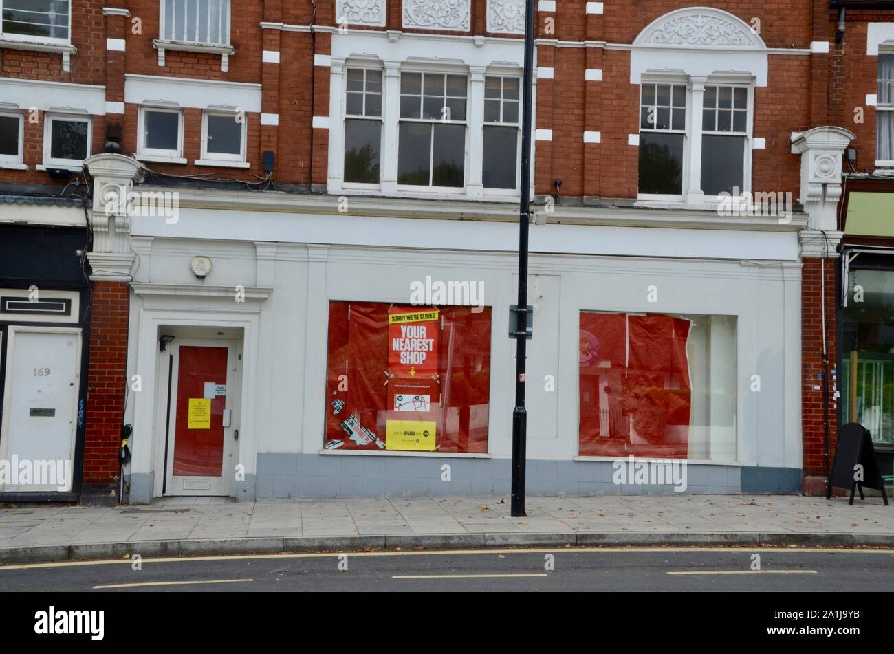 empty and closed down businesses and shops in north london england UK