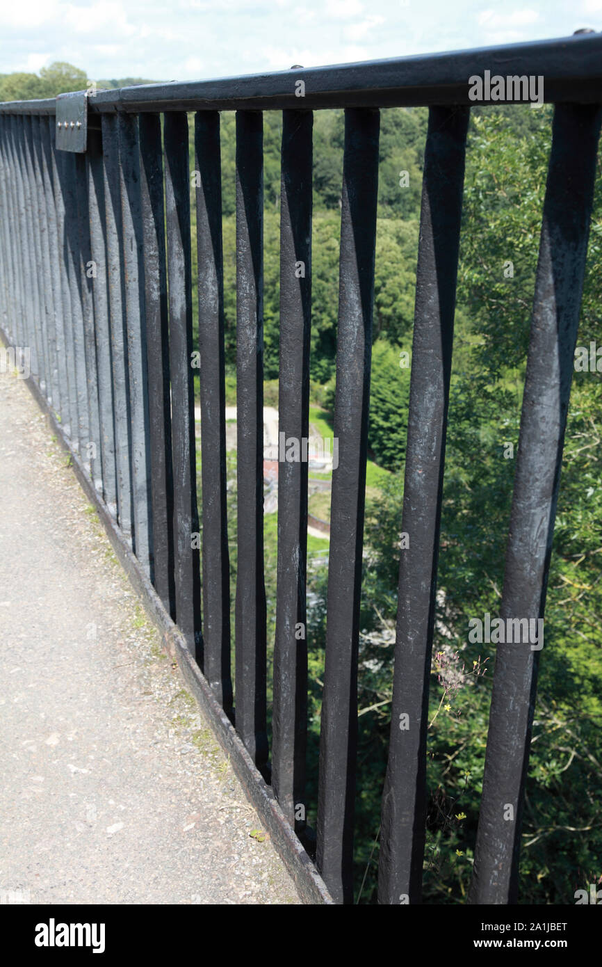 The railing next to the towpath on Pontcysyllte Aqueduct which carries the Llangollen Canal over the river Dee in north Wales Stock Photo
