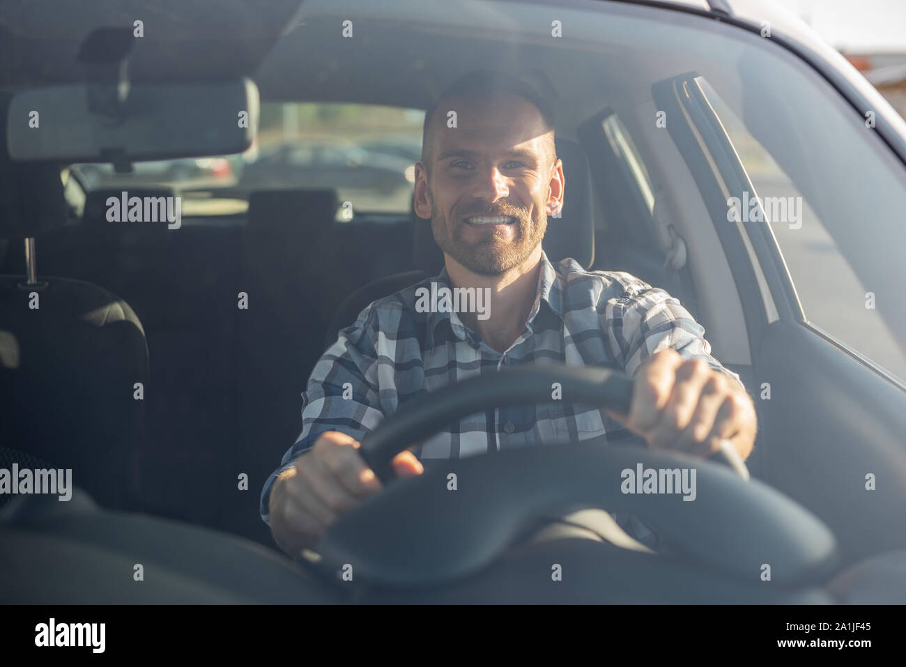 A man driving a car Stock Photo - Alamy