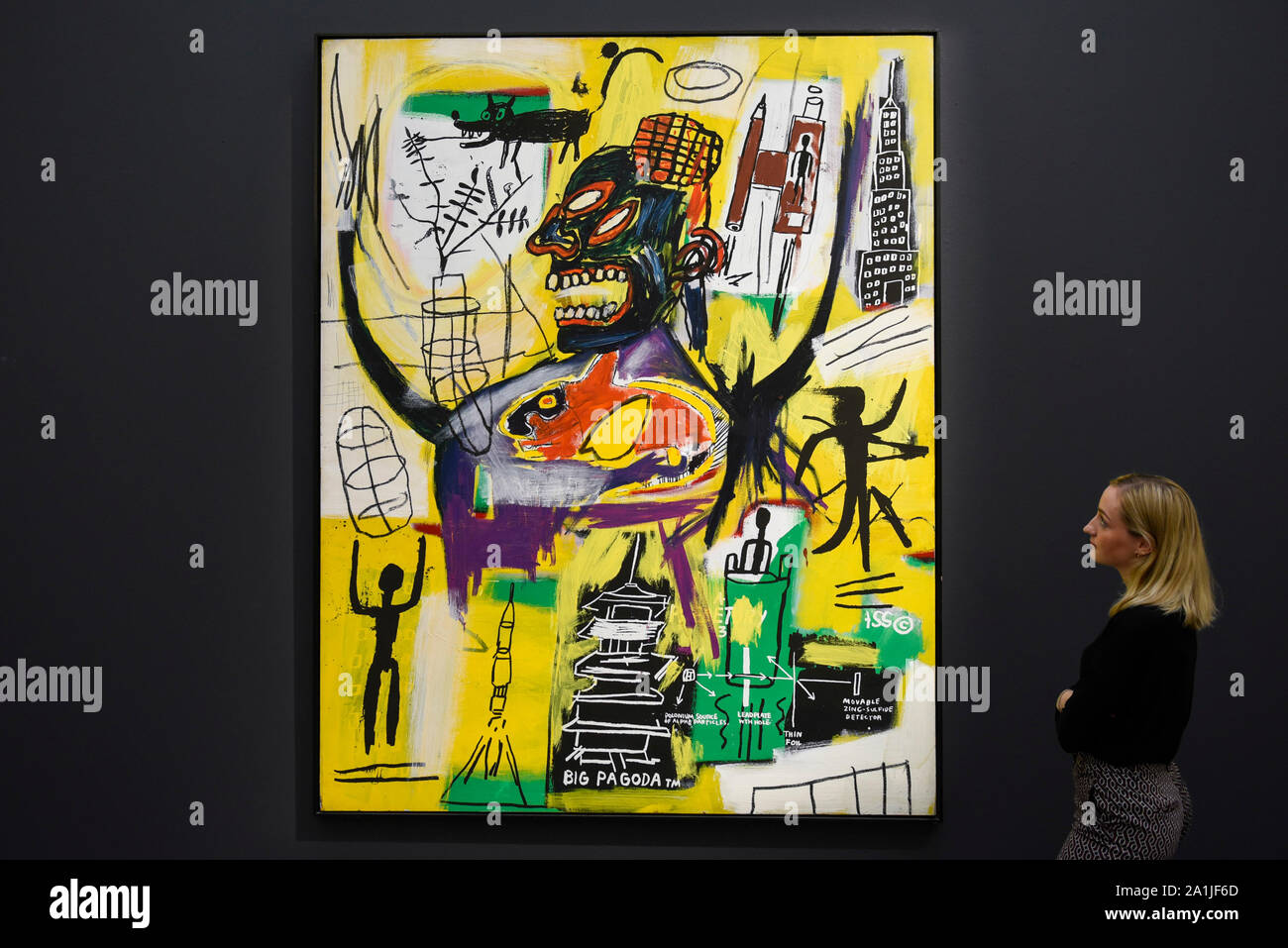 London, UK. 27 September 2019. A staff member views "Pyro", 1984, by Jean-Michel  Basquiat (Est. above GBP 9m). Preview of Sotheby's Frieze Week Contemporary  Art exhibition at its New Bond Street galleries.