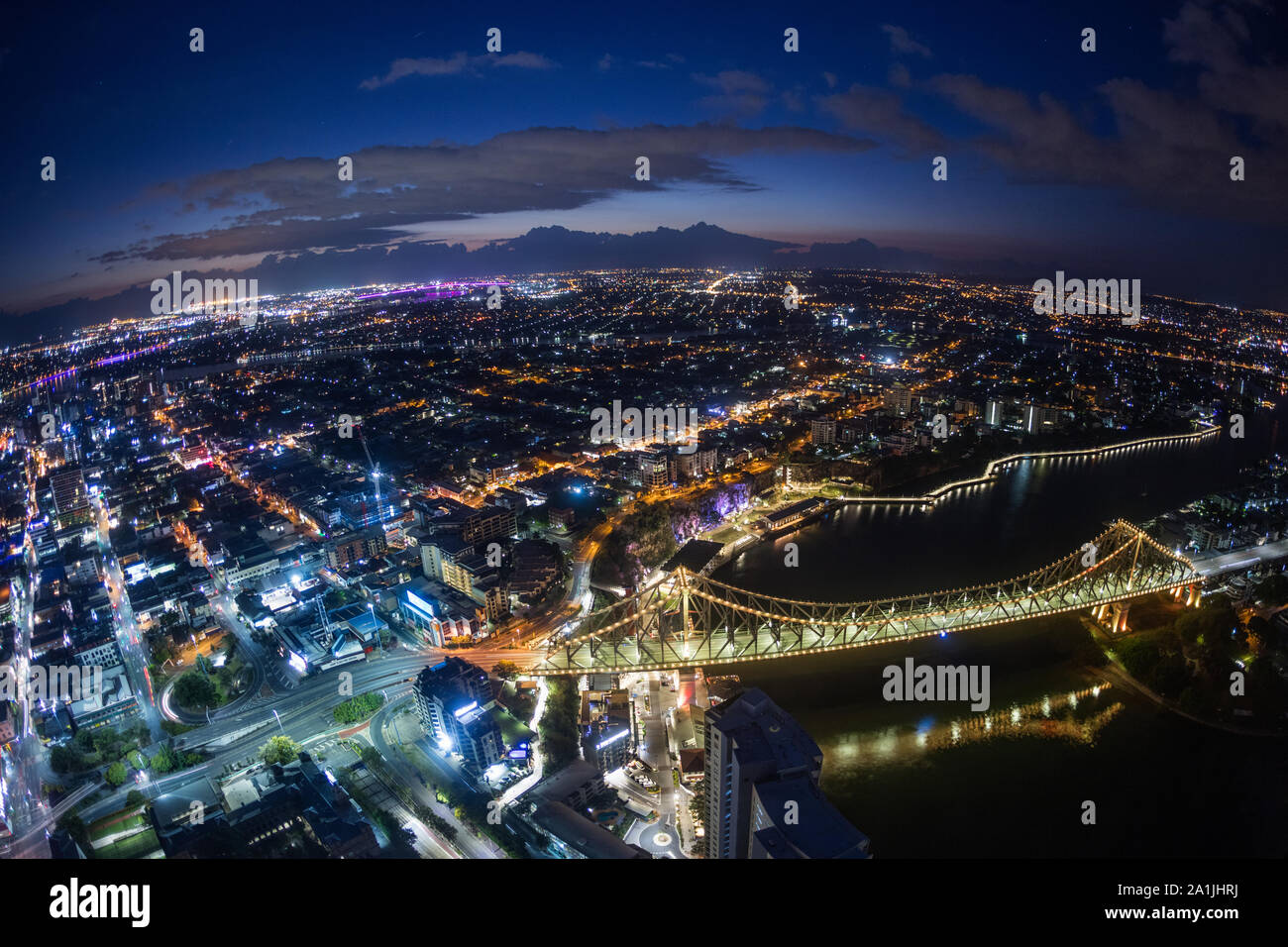 Brisbane at twilight with the Story Bridge and Brisbane River from aerial vantage point. Australia. Stock Photo