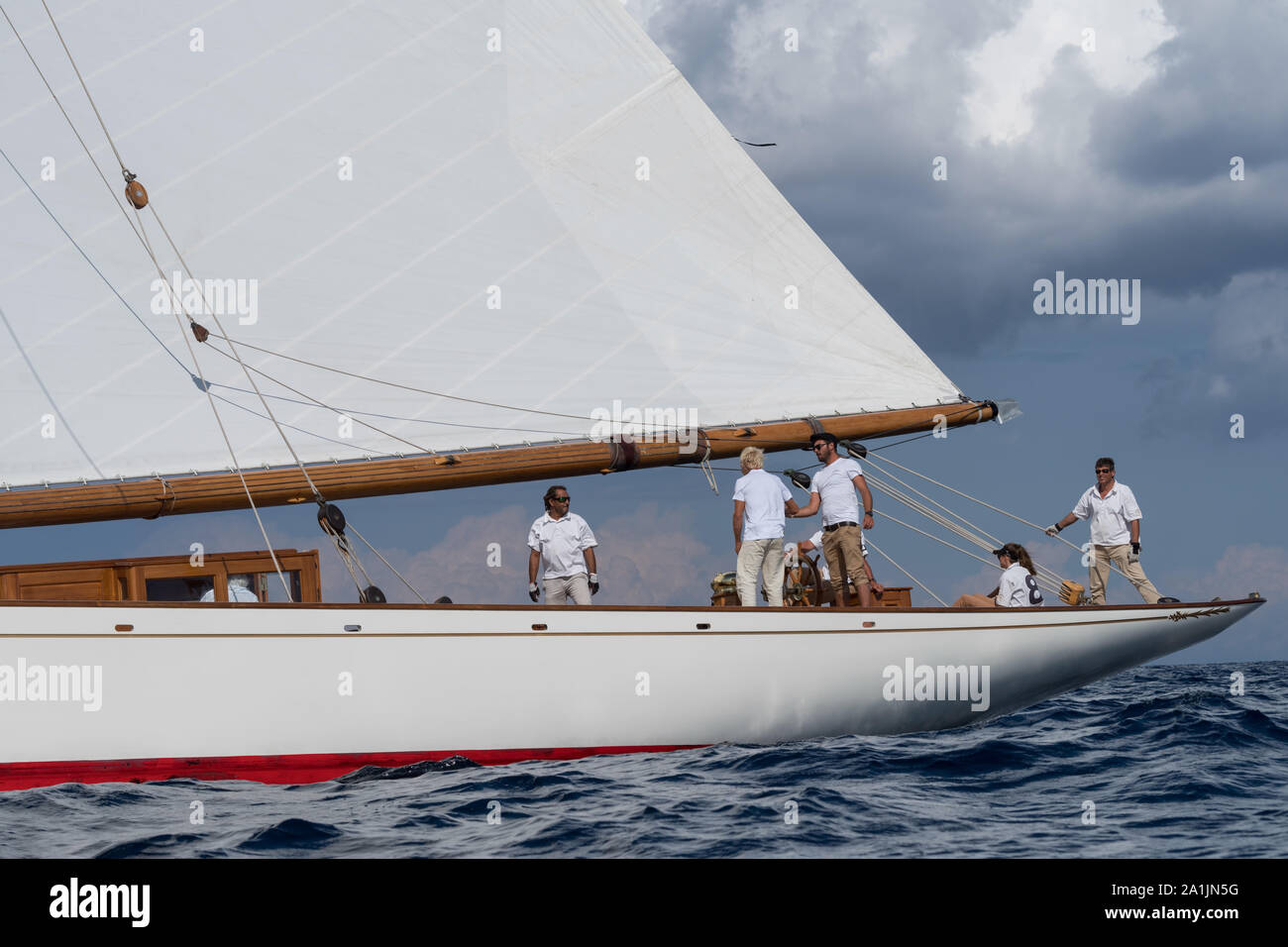 Crew members aboard on Moonbeam IV classic sail yacht, during regata in