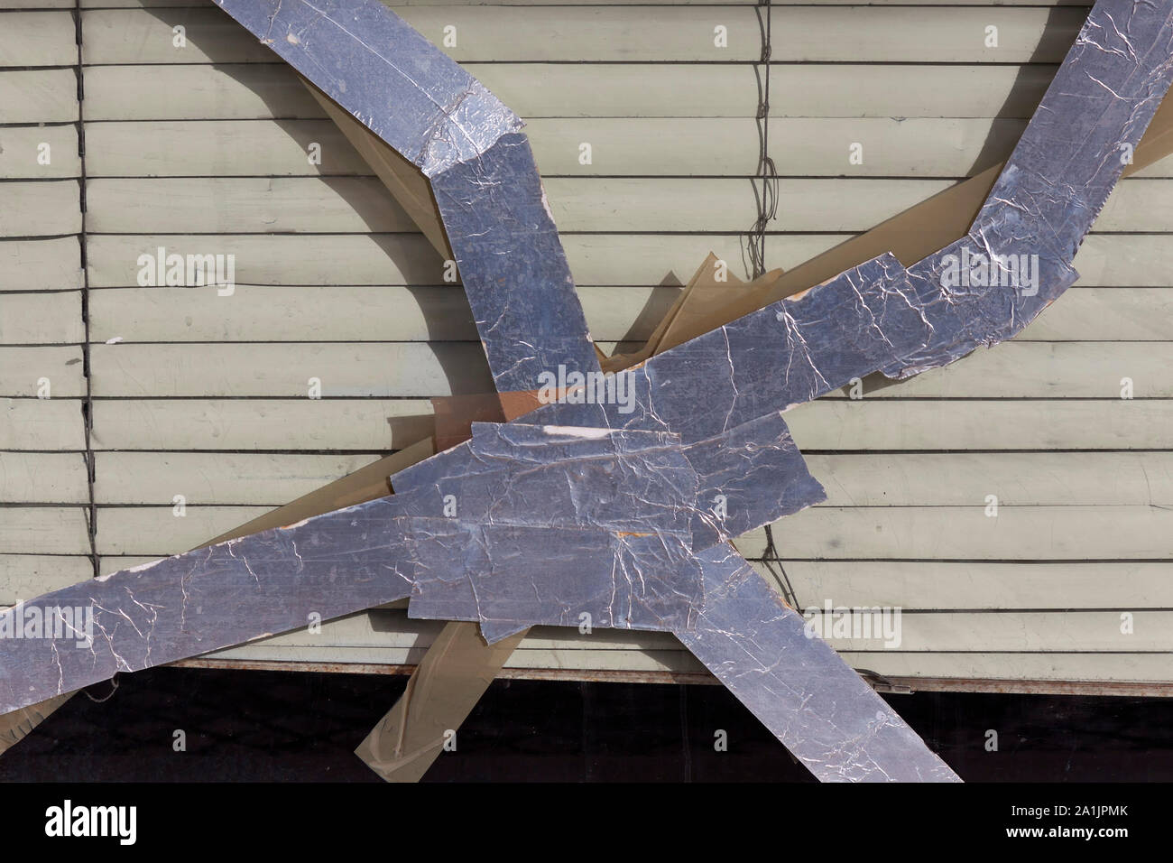 Adhesive tape glued window Stock Photo Alamy