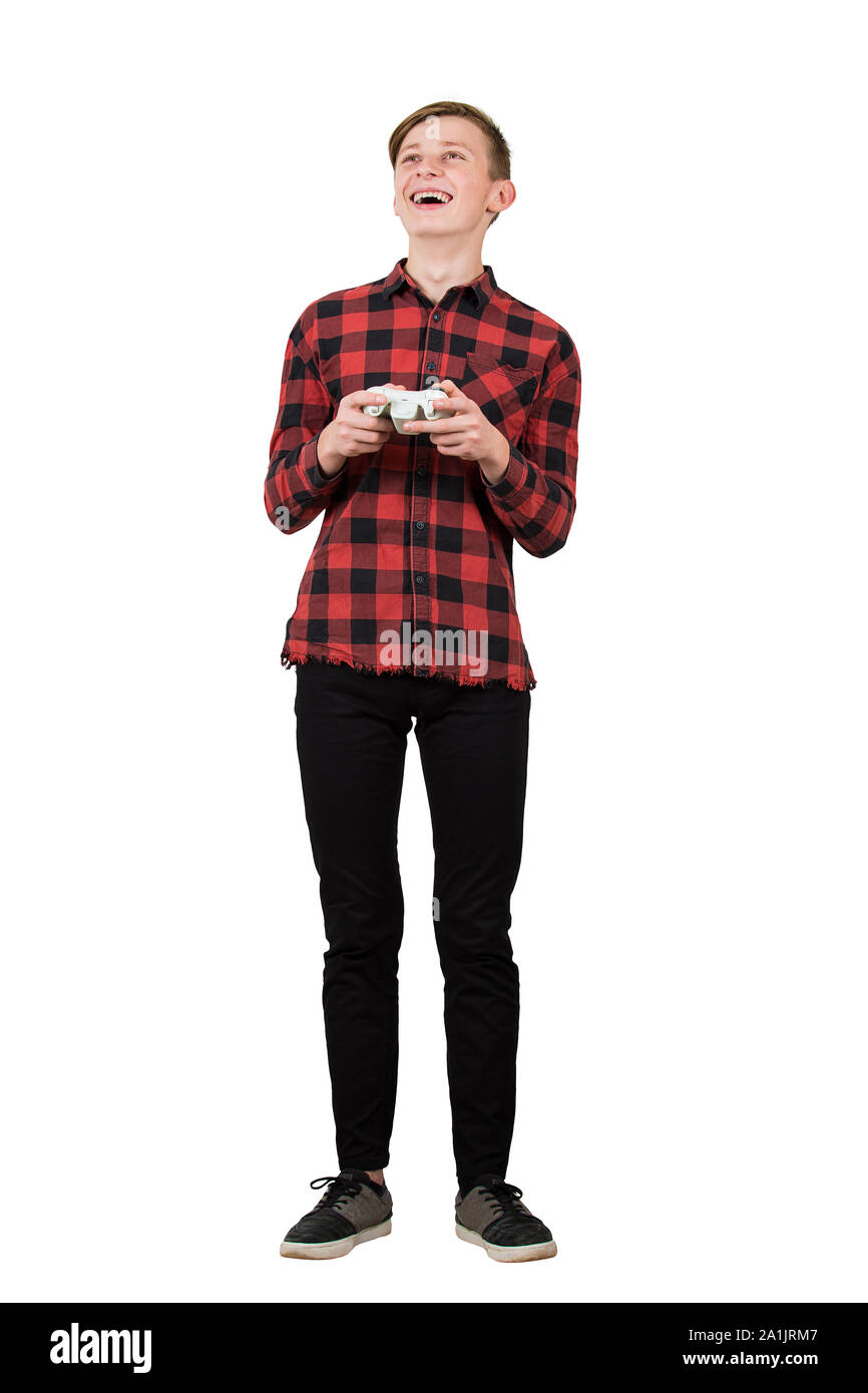 Fascinated teen boy playing video games isolated over white background