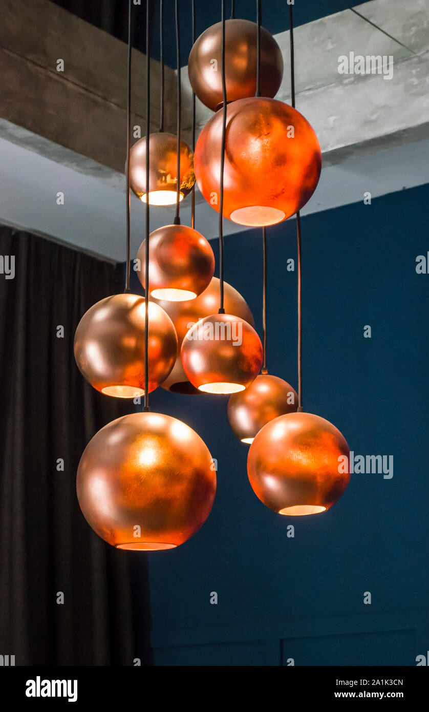 .Lamp copper balls original decorative lighting.Interior photo Stock