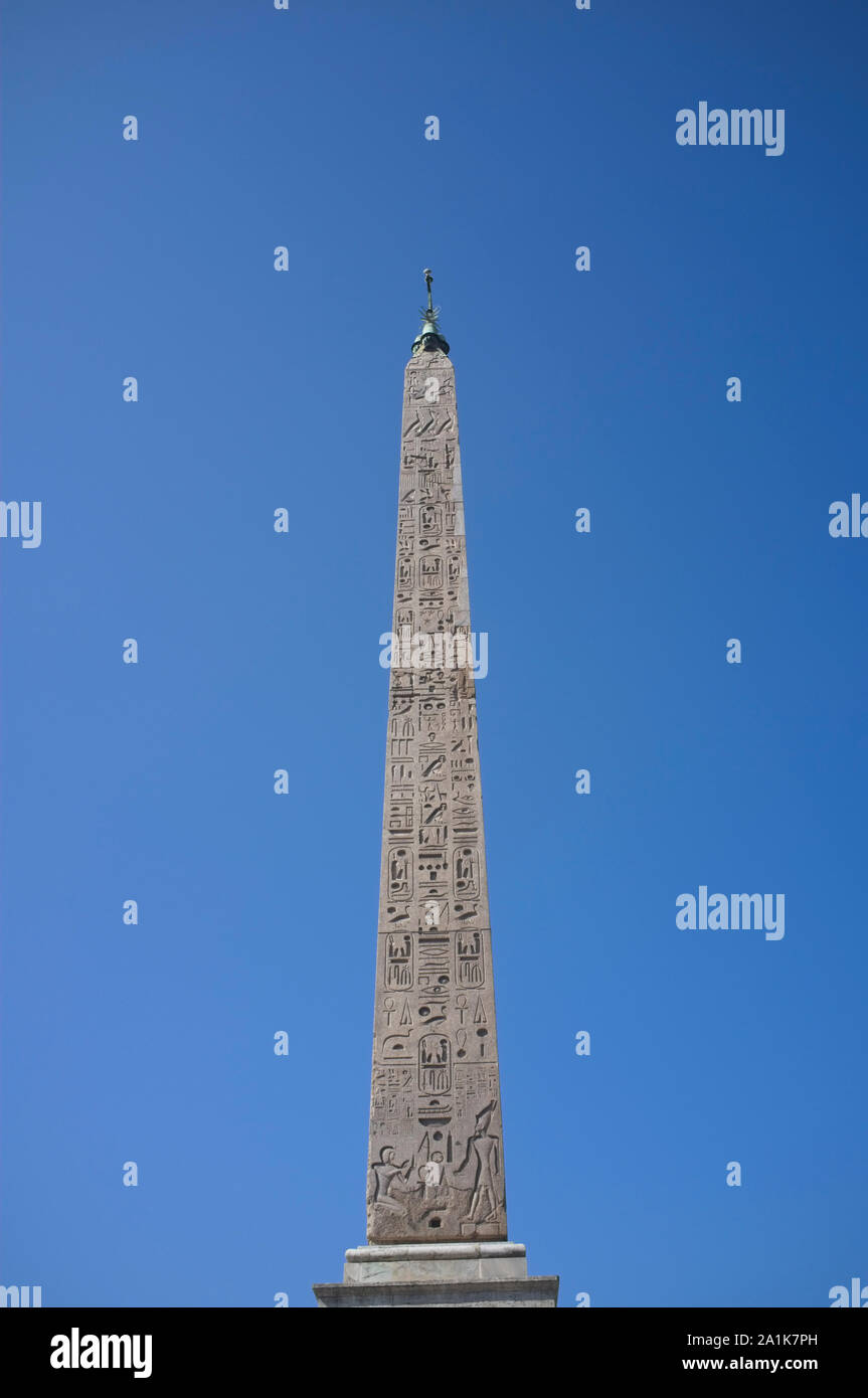 The Egyptian obelisk of Ramesses II from Heliopolis in the centre of the Piazza del Populo in Rome Stock Photo