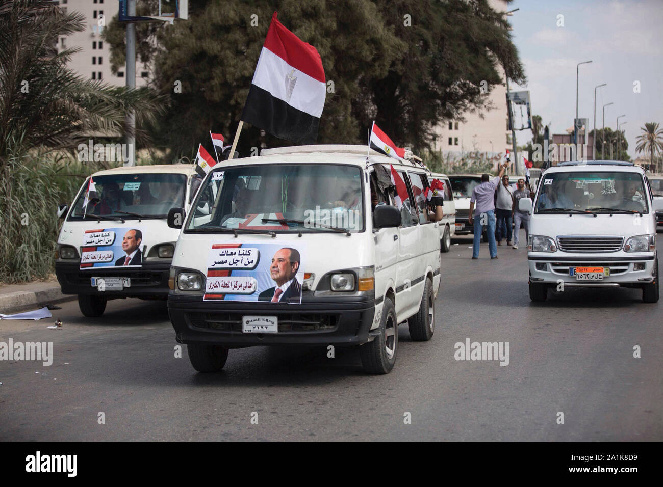 El Mahalla El Kubra, Egypt. 27th Sep, 2019. Vans are seen carrying  supporters of Egyptian President Abdel Fattah el-Sisi from El-Mahalla  El-Kubra to the capital to take part in a pro-government rally.