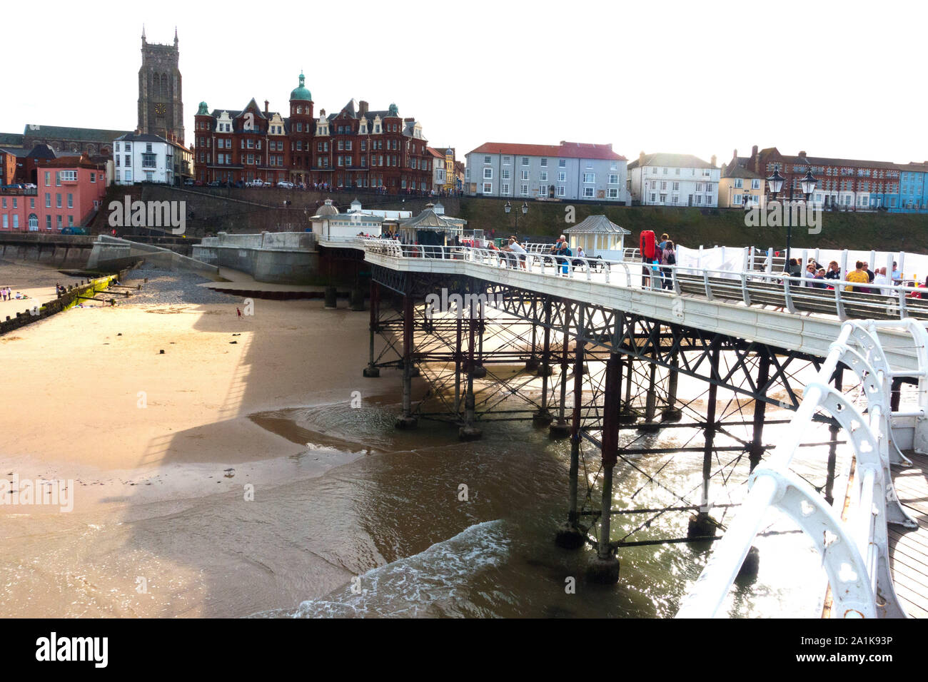 View of Cromer, Norfolk, and the 14th century church dedicated to St Peter and St Paul as seen from the pier Stock Photo