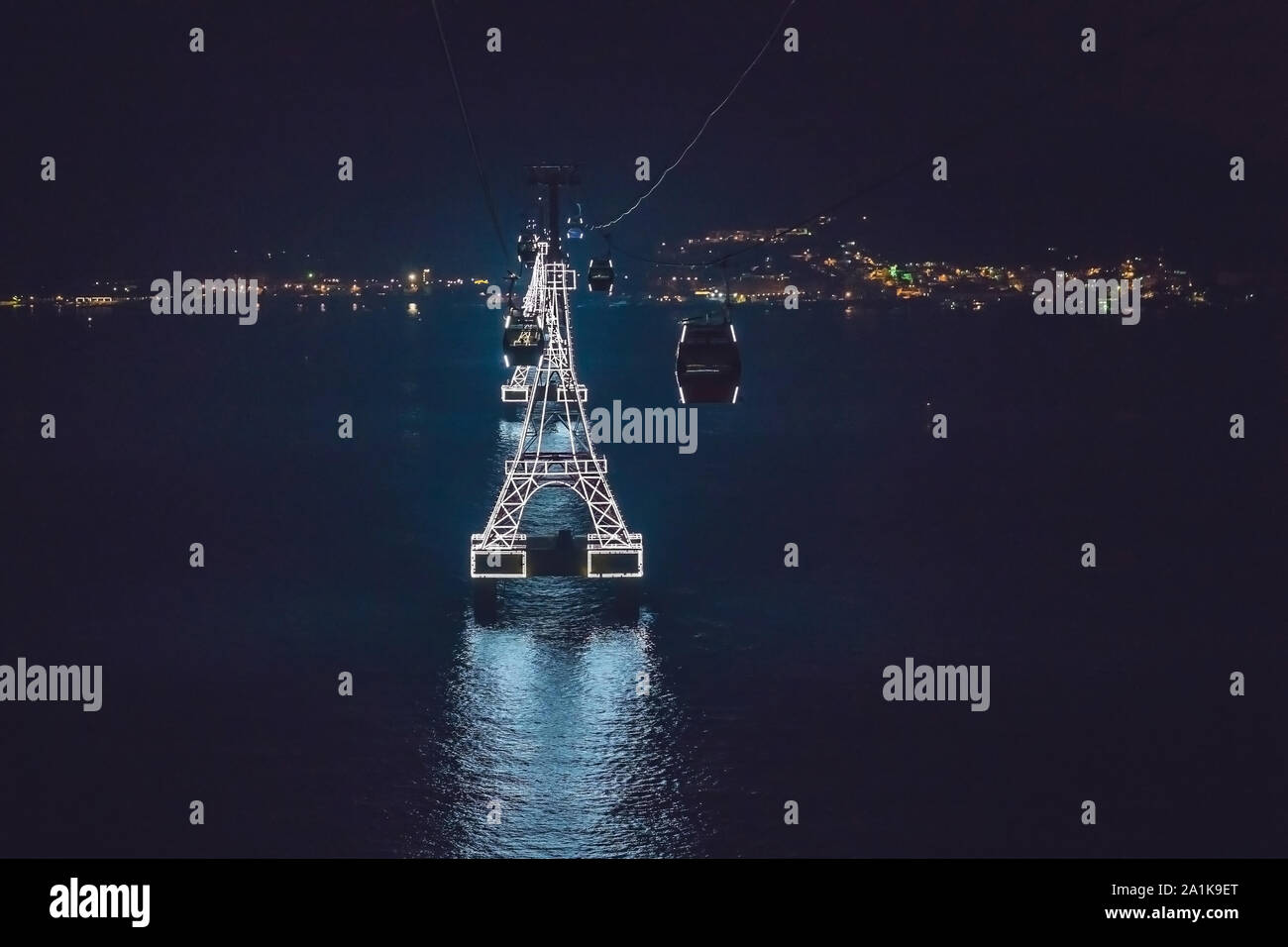 Night cable car over sea leading to Vinpearl land, Nha Trang, Vietnam Stock Photo