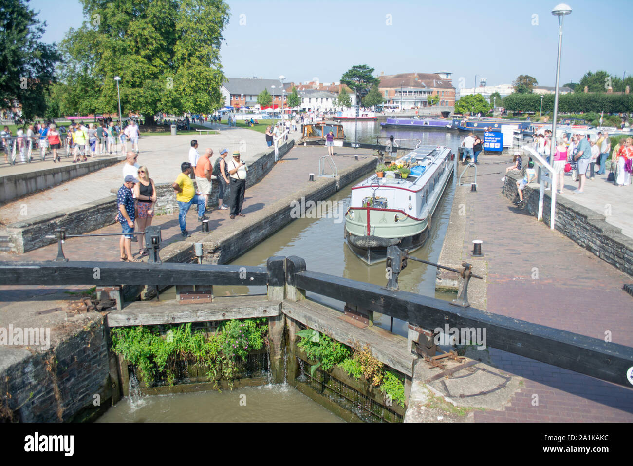 Narrow boat passing through a lock on the River Avon at Stratford-Upon-Avon UK Stock Photo