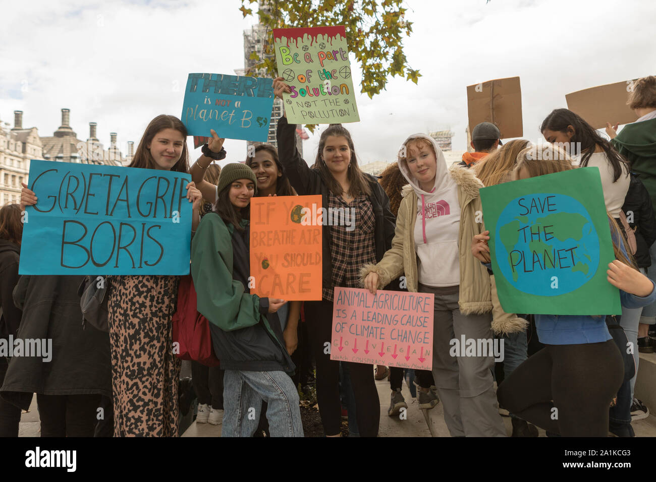 Westminster, London, UK. 27th Sept, 2019. Students, school children and adults protest for the climate, demanding that governments take the necessary action to decrease carbon dioxide emissions and act in accordance with the Paris Agreement. Penelope Barritt/Alamy Live News Stock Photo