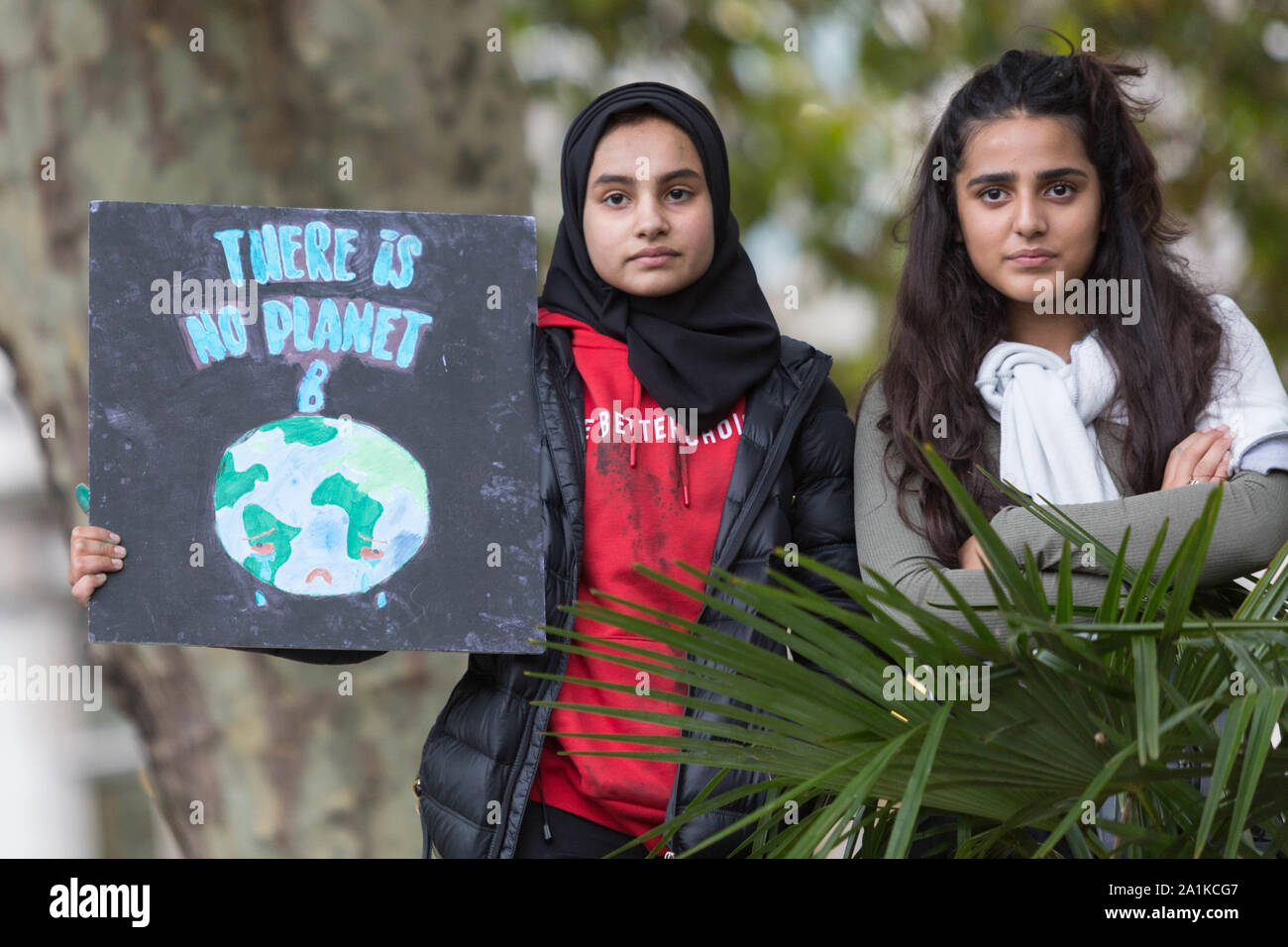 Westminster, London, UK. 27th Sept, 2019. Students, school children and adults protest for the climate, demanding that governments take the necessary action to decrease carbon dioxide emissions and act in accordance with the Paris Agreement. Penelope Barritt/Alamy Live News Stock Photo