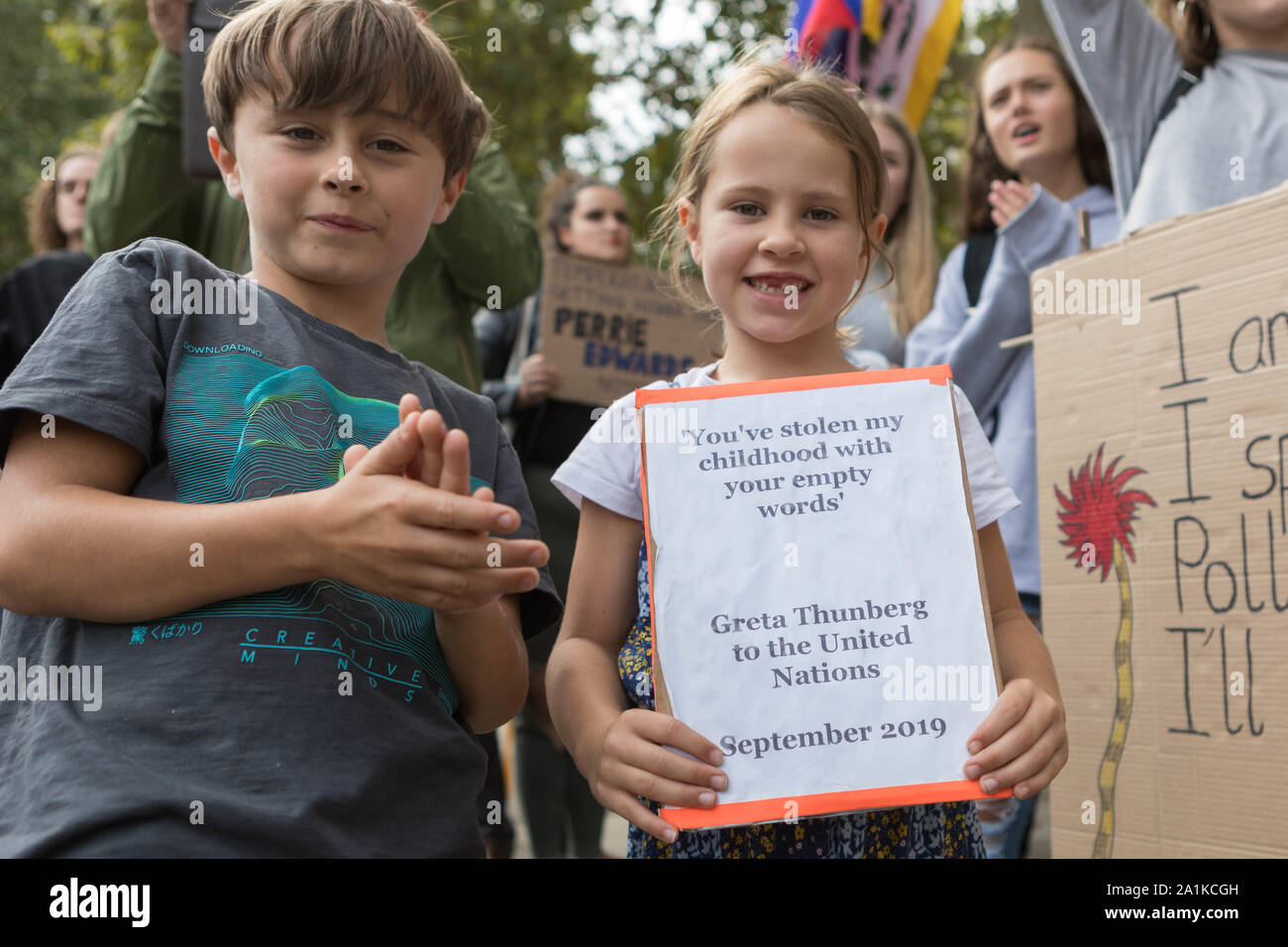 Westminster, London, UK. 27th Sept, 2019. Students, school children and adults protest for the climate, demanding that governments take the necessary action to decrease carbon dioxide emissions and act in accordance with the Paris Agreement. Penelope Barritt/Alamy Live News Stock Photo
