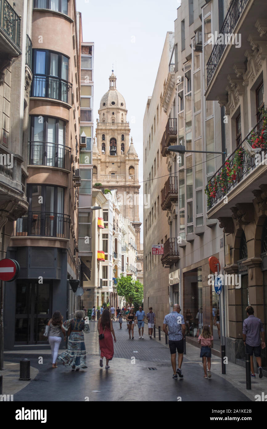 View of Murcia Cathedral Bell Tower along the Calle de la Frenaria. Stock Photo