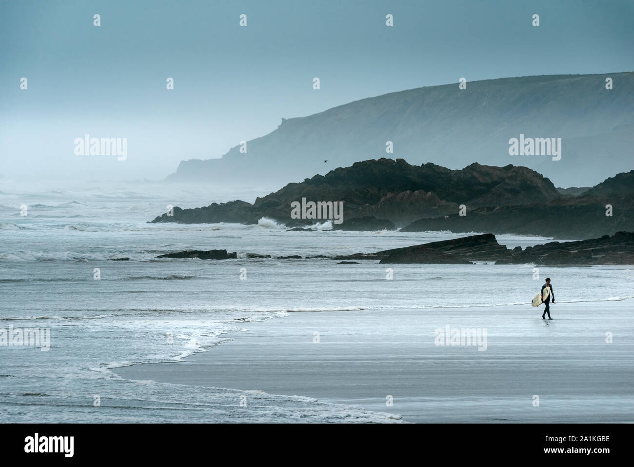 Bude, North Cornwall, England. Friday 27th September 2019. UK Weather. After a night of torrential rain and gale force winds, the stormy weather continues as a lone surfer has a windswept Summerleaze beach all to herself in  Bude North Cornwall. Terry Mathews/Alamy Live News. Stock Photo