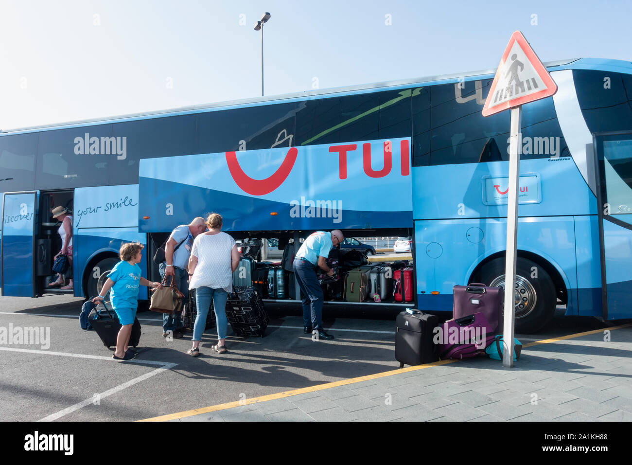 Tourists arriving at Gran Canaria airport on Thomson TUI coach. Canary Islands, Spain. Stock Photo