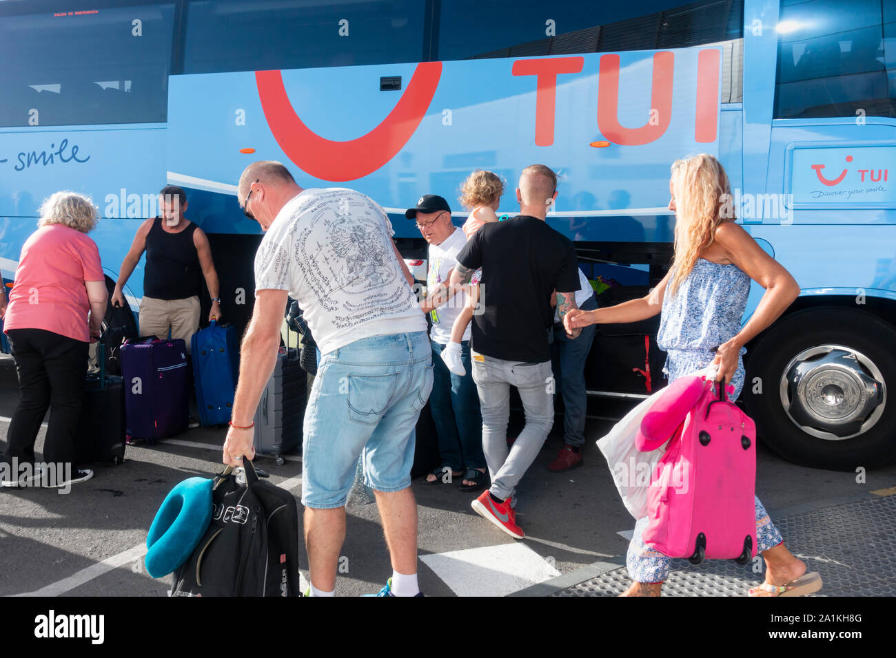 Tourists arriving at Gran Canaria airport on Thomson TUI coach. Canary Islands, Spain. Stock Photo