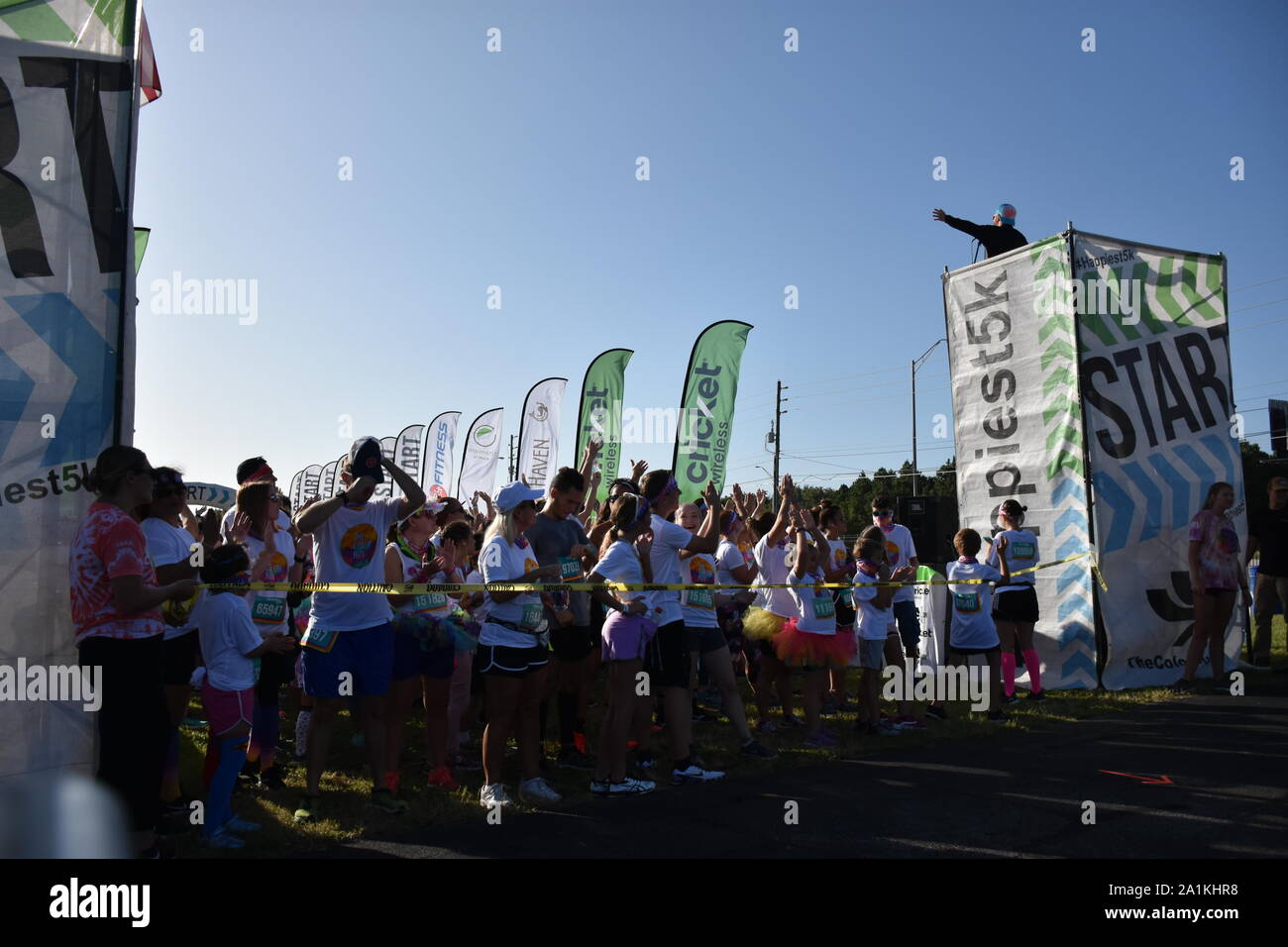 This photograph was taken at the 2019 Color Run 5K road race. These ...