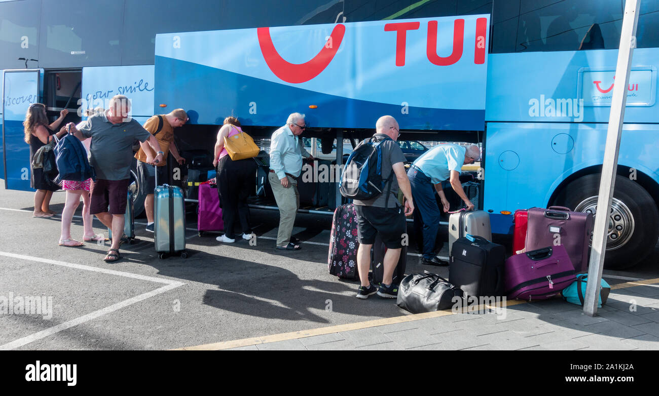 Tourists arriving at Gran Canaria airport on Thomson TUI coach. Canary Islands, Spain. Stock Photo