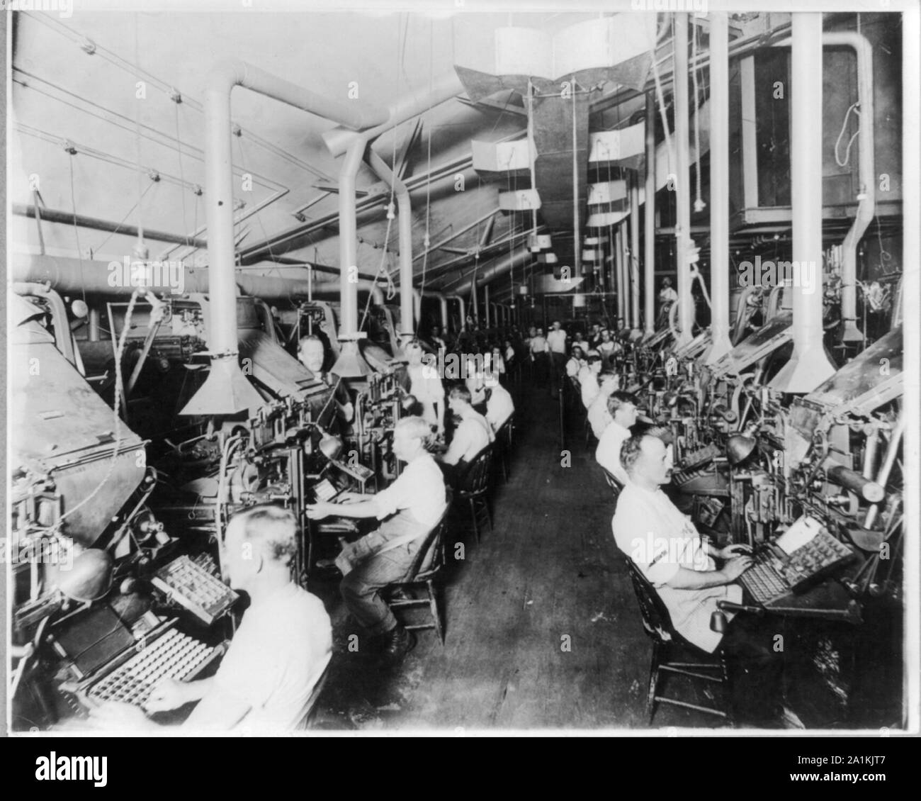 Newspaper publishing - N.Y. Herald: Composing room and linotype machines Stock Photo