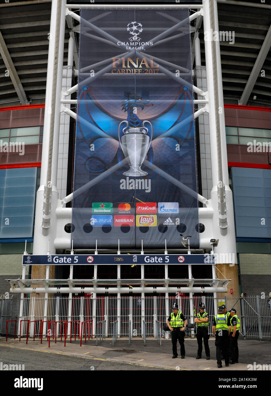 Police from outside on of the stadiums many access gates - ahead of tomorrows UEFA Champions League Final, National Stadium of Wales, Cardiff - 2nd June 2017. Stock Photo