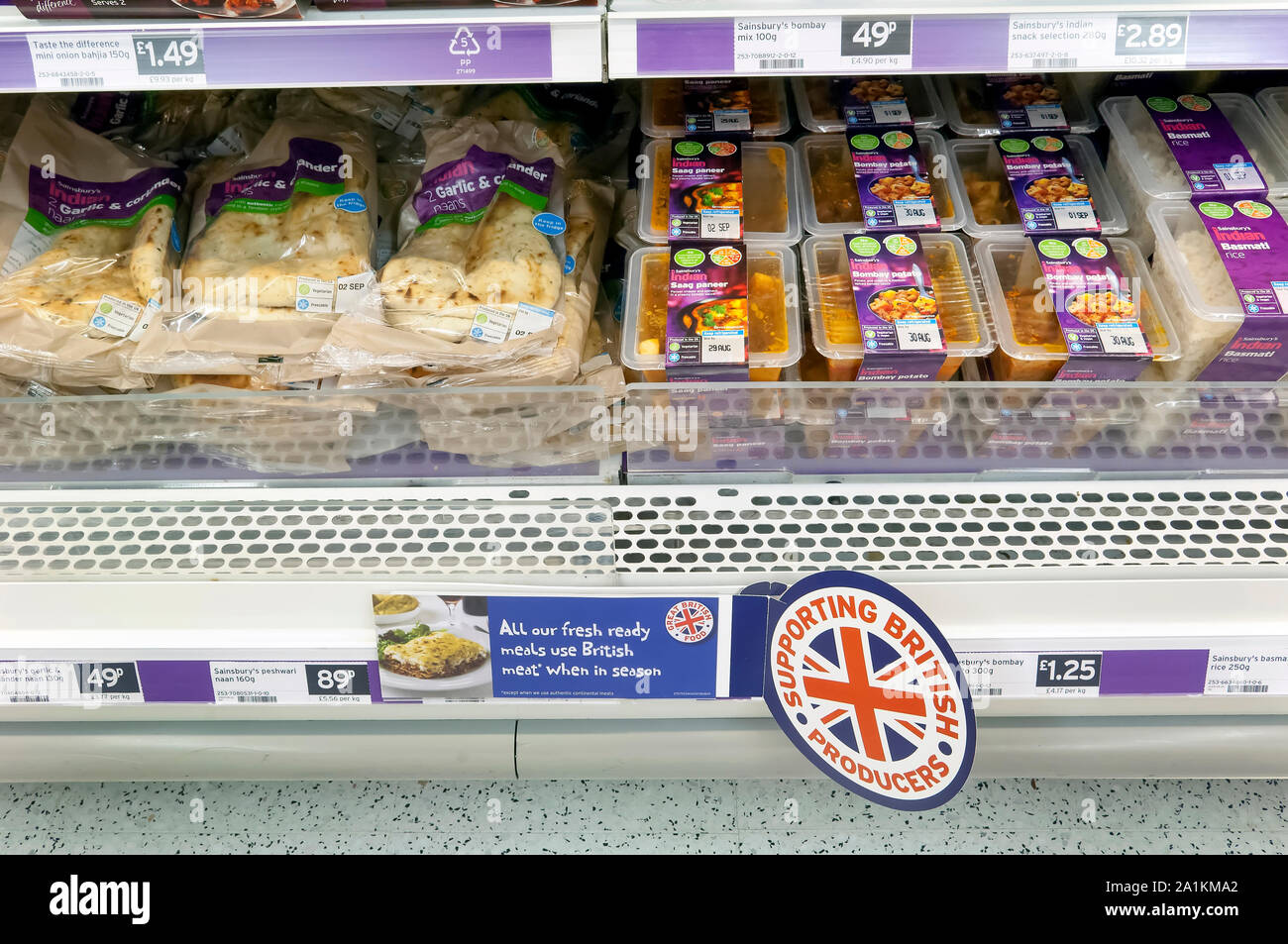 Ready meals on display in Sainsbury's supermarket fridges Stock Photo
