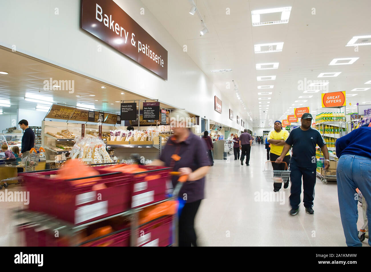 People shopping and working in Sainsbury's supermarket Stock Photo Alamy