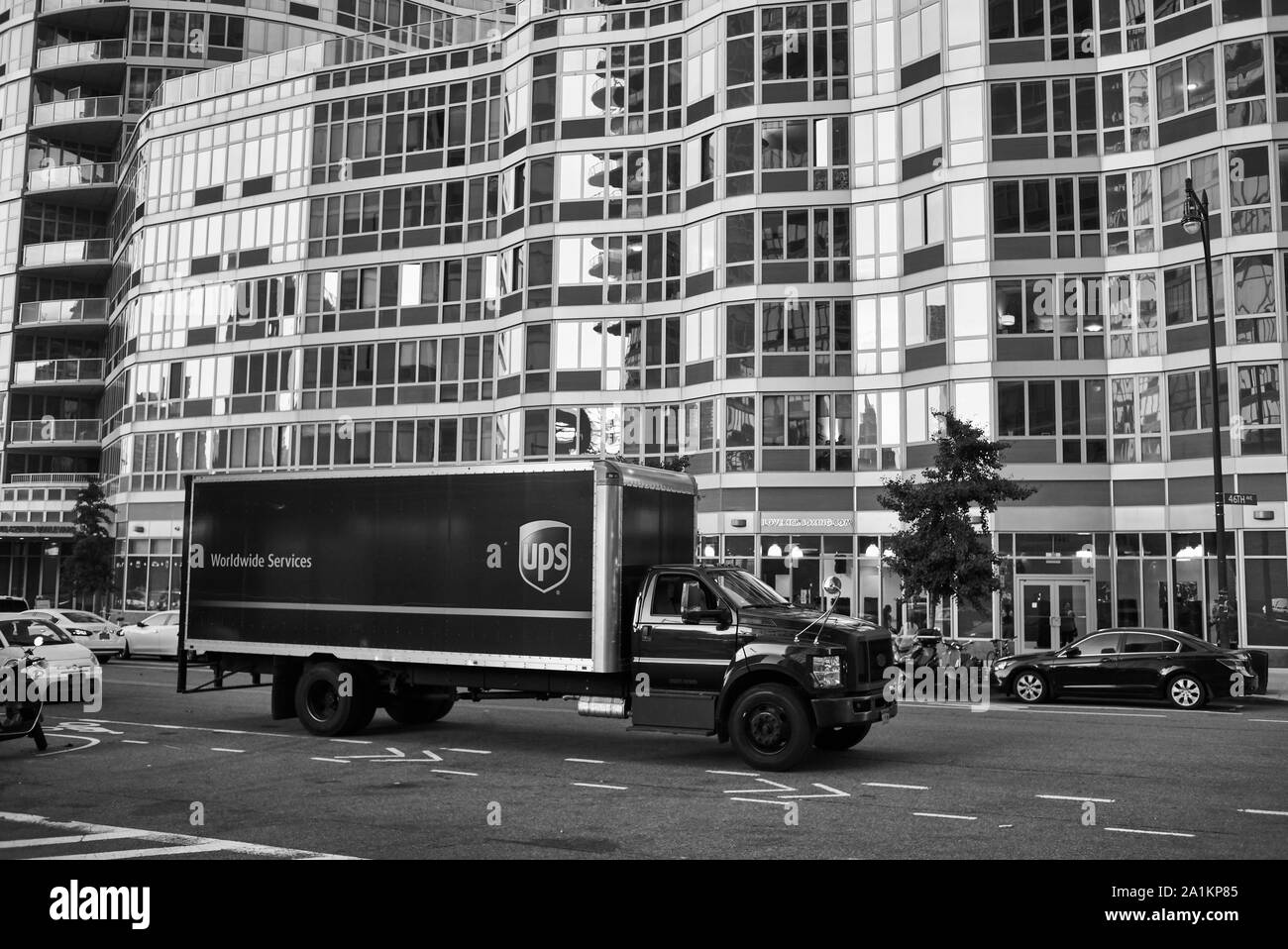 UPS big truck delivering packages in Long Island City Stock Photo