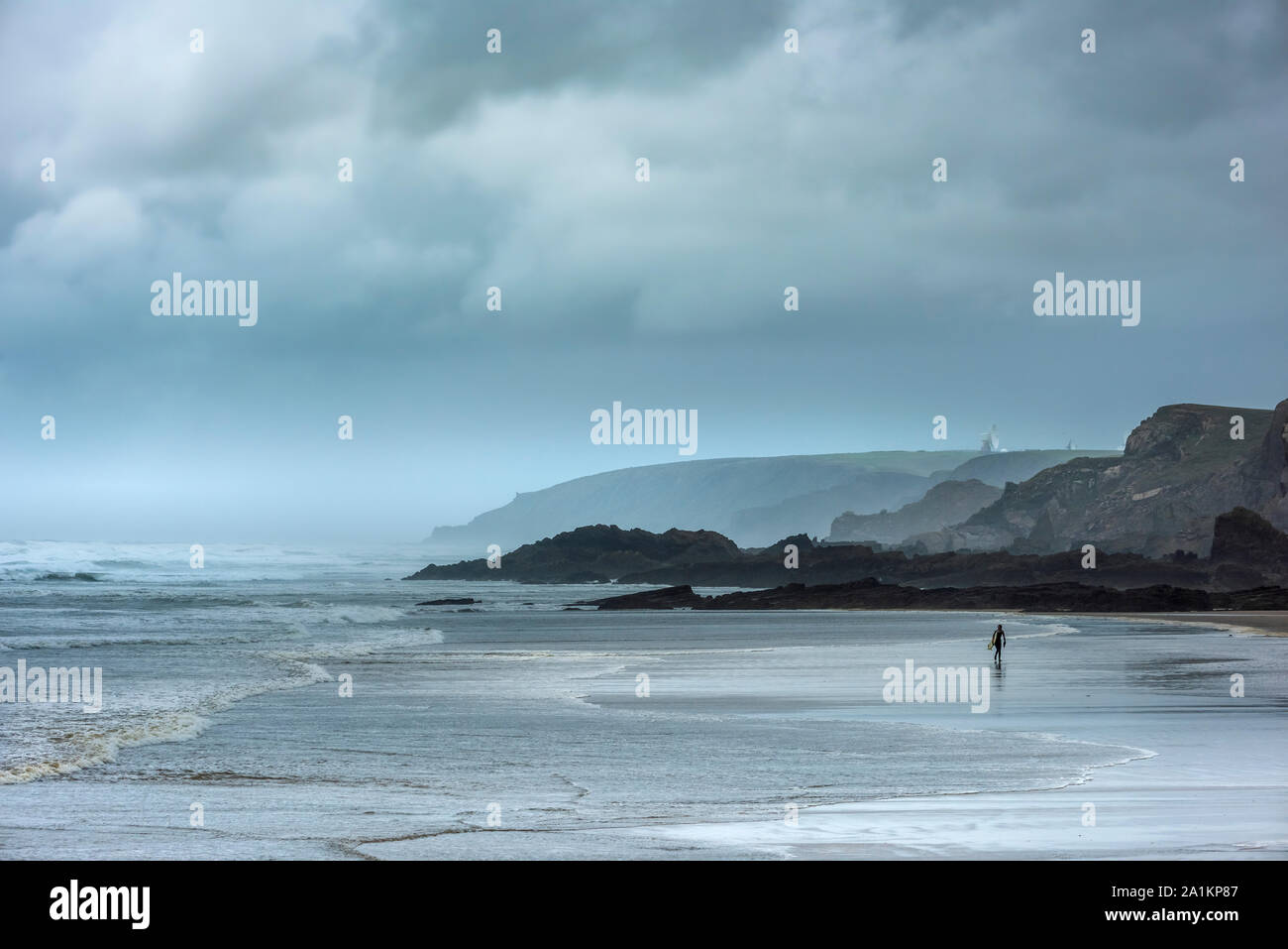 Bude, North Cornwall, England. Friday 27th September 2019. UK Weather. After a night of torrential rain and gale force winds, the stormy weather continues as a lone surfer has a windswept Summerleaze beach all to herself in  Bude North Cornwall. Terry Mathews/Alamy Live News. Stock Photo