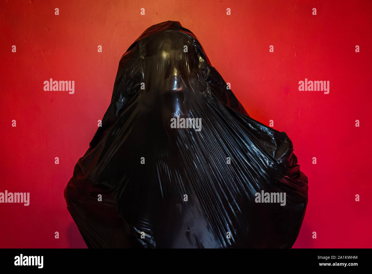 Person Trapped in Black Plastic Bag. Concept of Horror Movie Scene.  Suffocation and Death. Dark Stock Photo Stock Photo - Alamy
