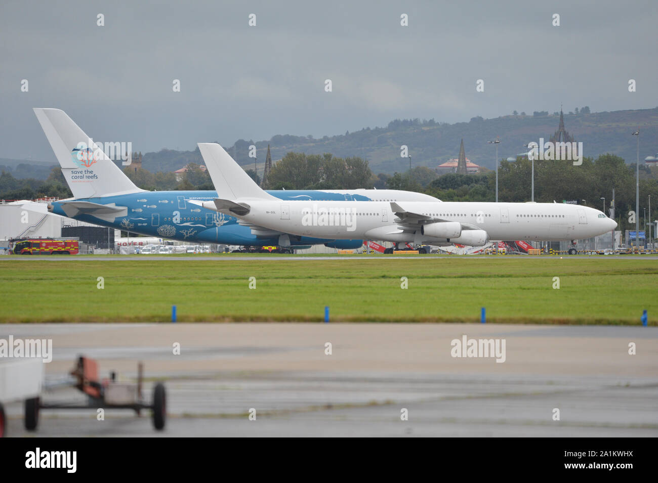 Glasgow, UK. 27 September 2019. Following the immediate fallout from the collapsed tour company Thomas Cook, Operation Matterhorn is still in full swing at Glasgow Airport. The grounded and impounded Thomas Cook aircraft have been moved to a quieter part of the airfield to make way for the wide body fleet needed for operation Matterhorn. In a Scottish aviation history first today is the first day that any Scottish airport has hosted two if the super jumbo behemoth Airbus A380-800 aircraft at the same time. Credit: Colin Fisher/Alamy Live News Stock Photo