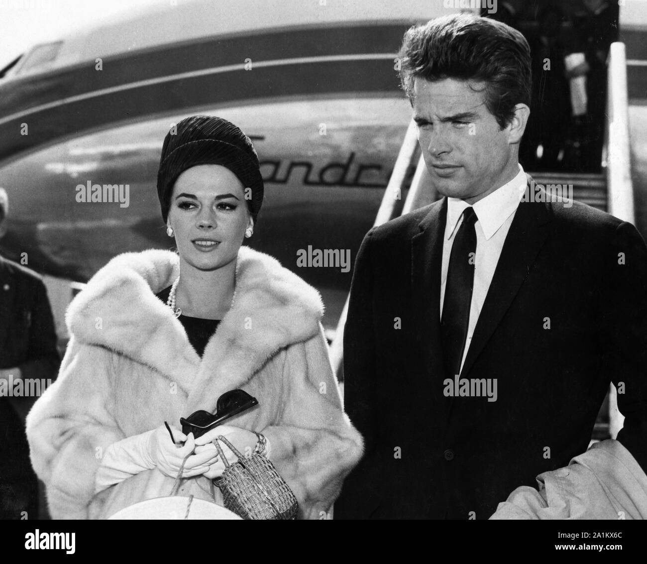 Natalie Wood and fiancee Warren Beatty arrive at Cannes airport in time to attend the Cannes Film Festival, 1962  File Reference # 33848-754THA Stock Photo