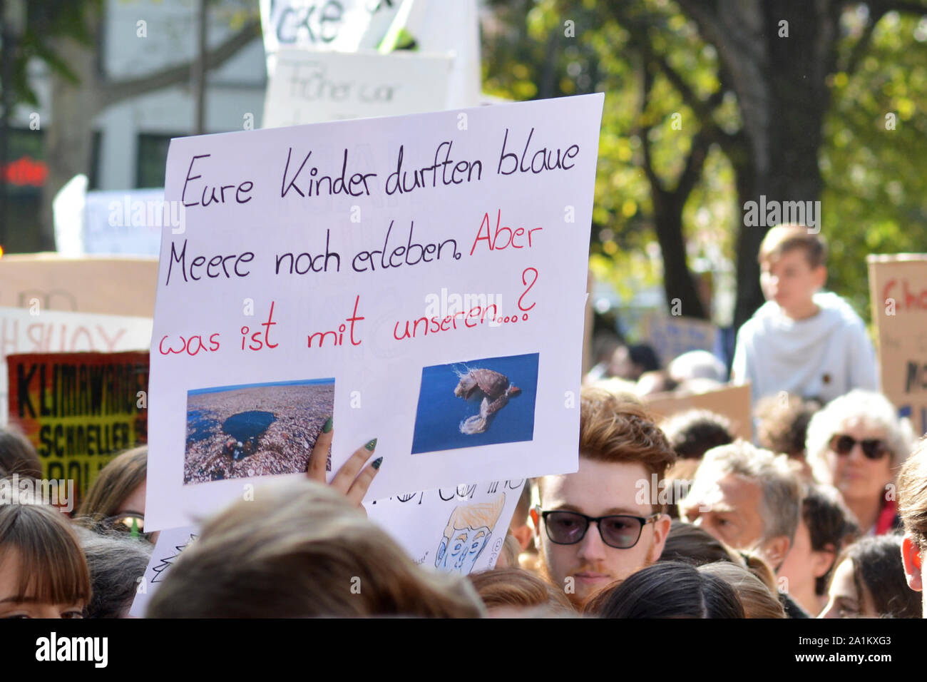 Heidelberg, Germany  Protest sign saying 'Your kids still got to see blue oceans' held up by young people during Global Fridays for Future Stock Photo