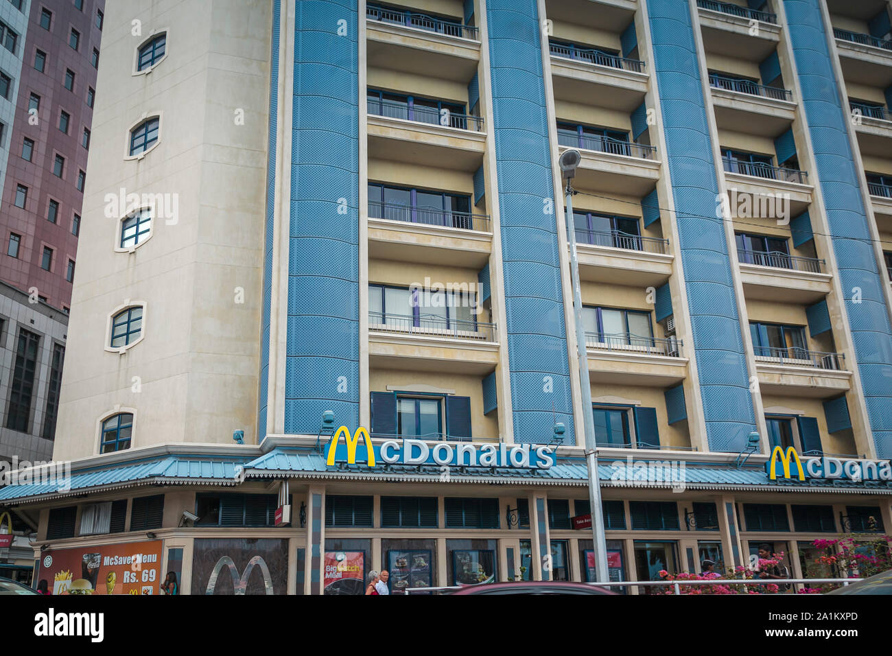 City of Port-Louis, Mauritius - A franchise of McDonald's on the groundfloor of a tall building Stock Photo