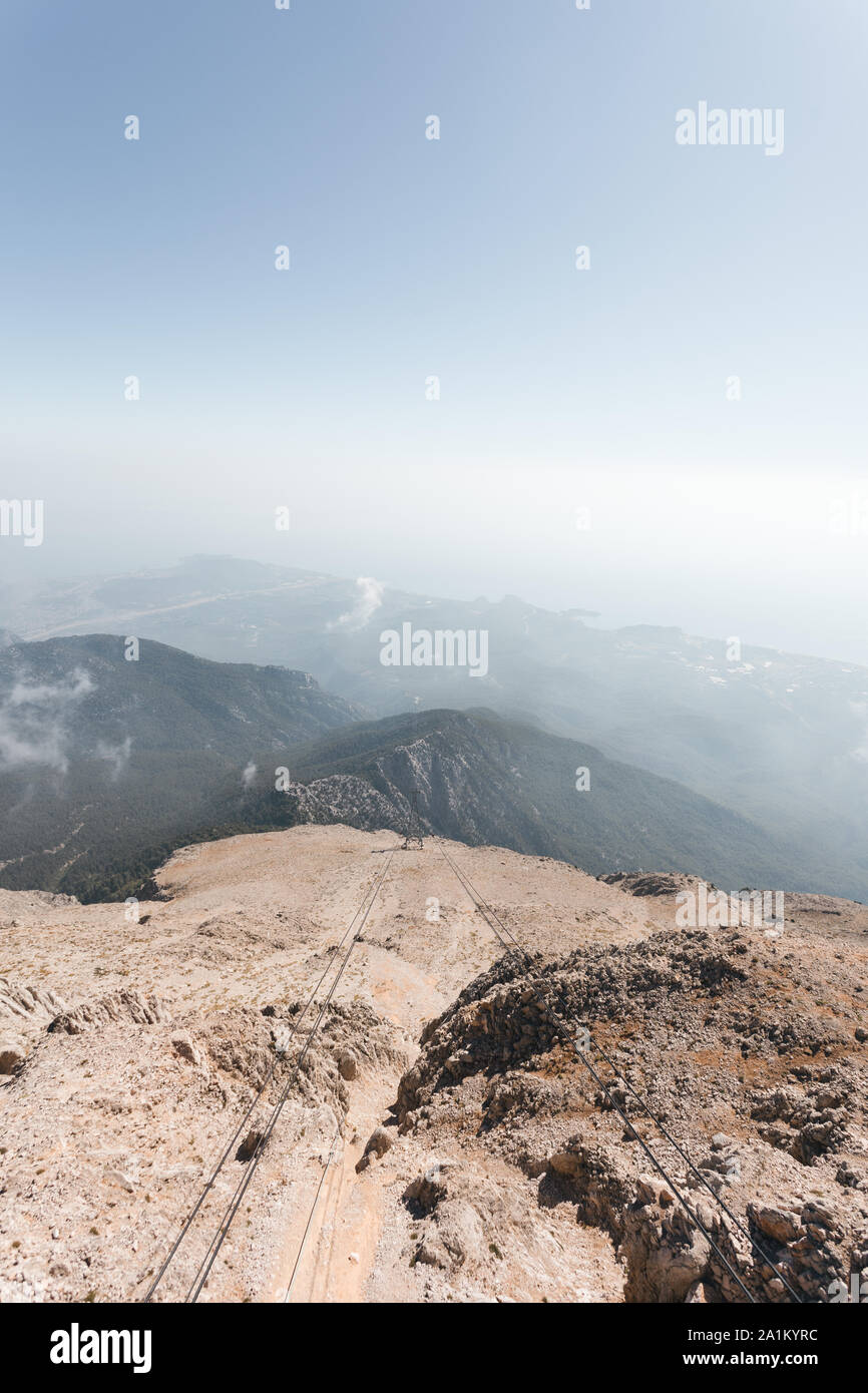 Panoramic view of Taurus Mountains with Olympos Teleferik cable cars in Kemer, Turkey Stock Photo
