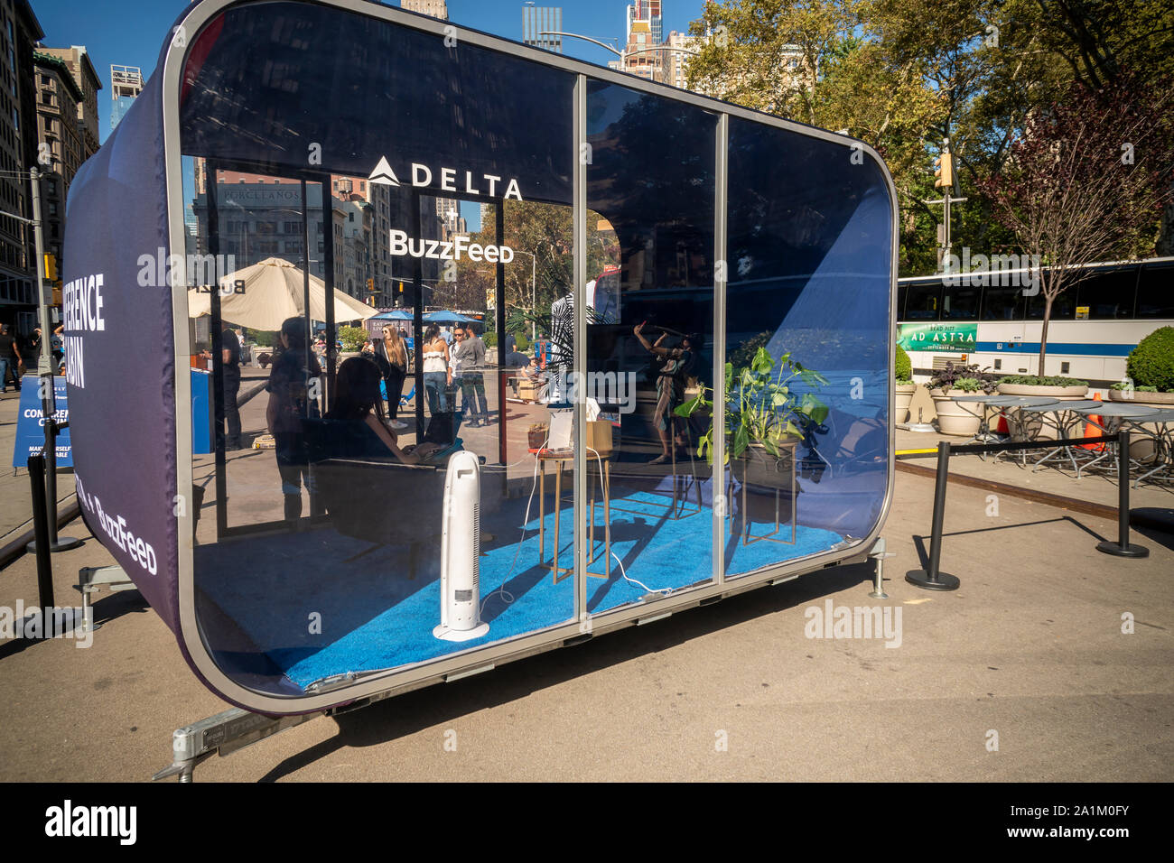 A Delta+Buzzfeed Conference Cabin branding event is dropped into 