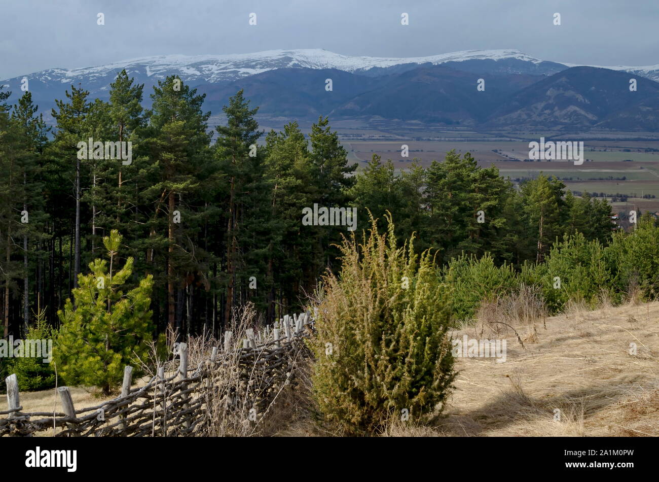 Village Chavdar in front of Balkan mountain in winter, Bulgaria Stock Photo