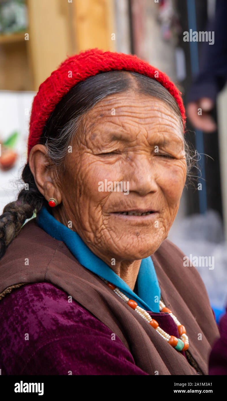 portrait of Ladakhi woman at street in Leh in Ladakh, India Stock Photo