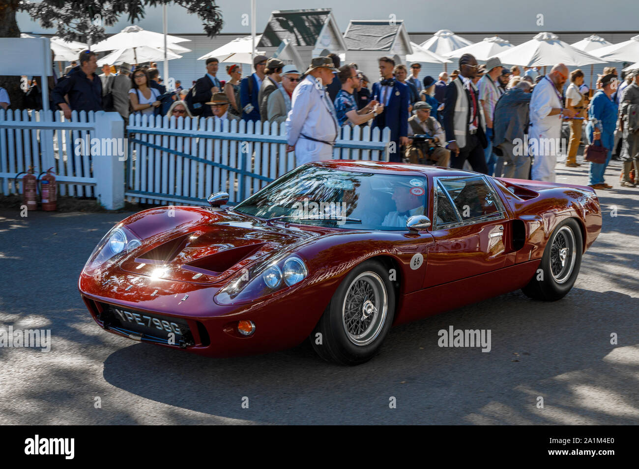1969 Ford GT MkIII course car enters the holding paddock at the 2019 Goodwood Revival, Sussex, UK. Stock Photo