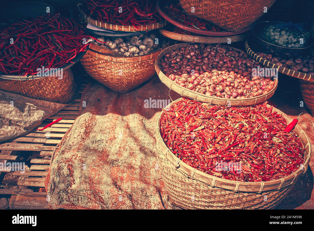 Moody image of colored spices at local market. Place for your text. Stock Photo