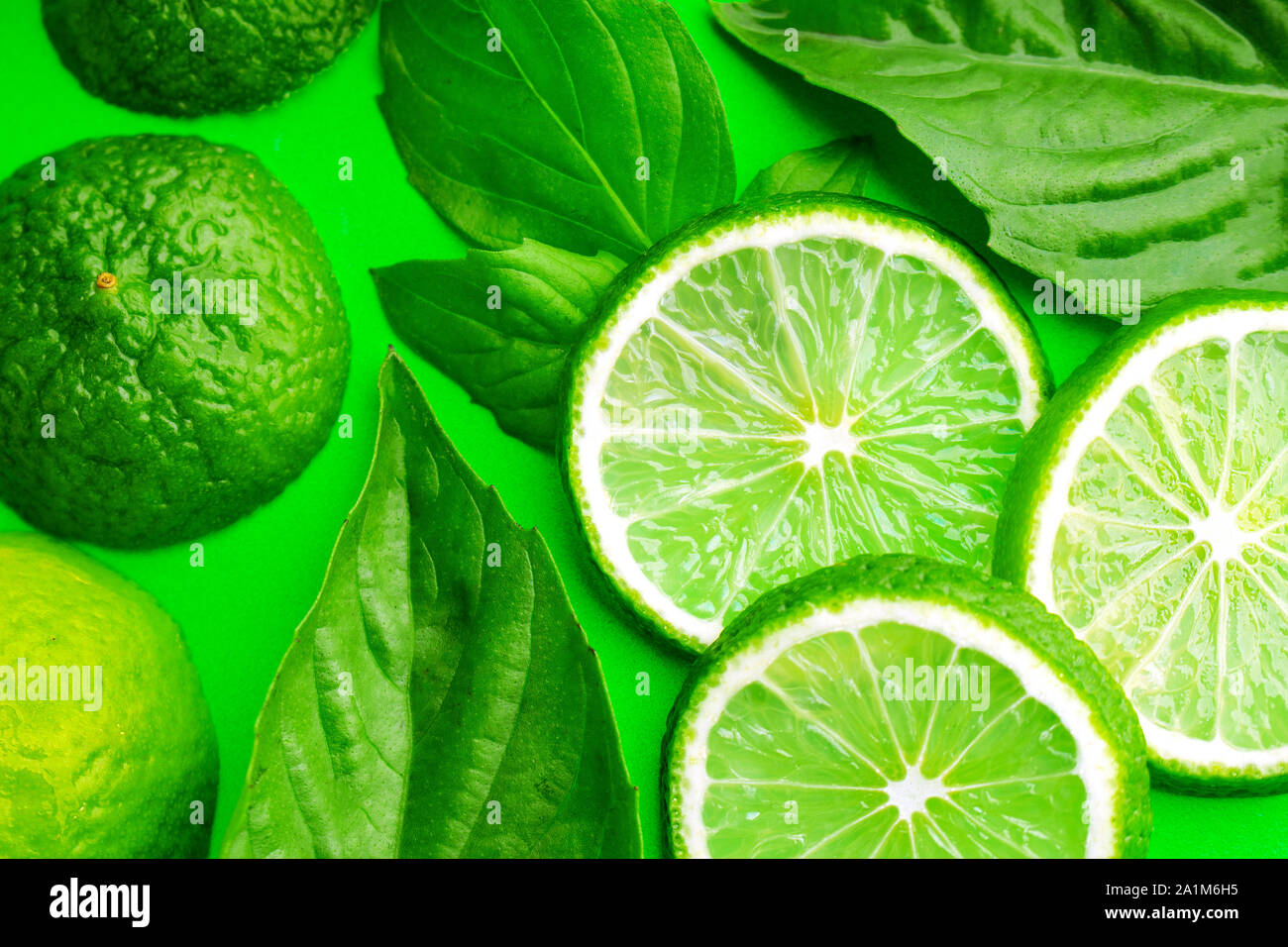 Lime slides with leafs around Stock Photo
