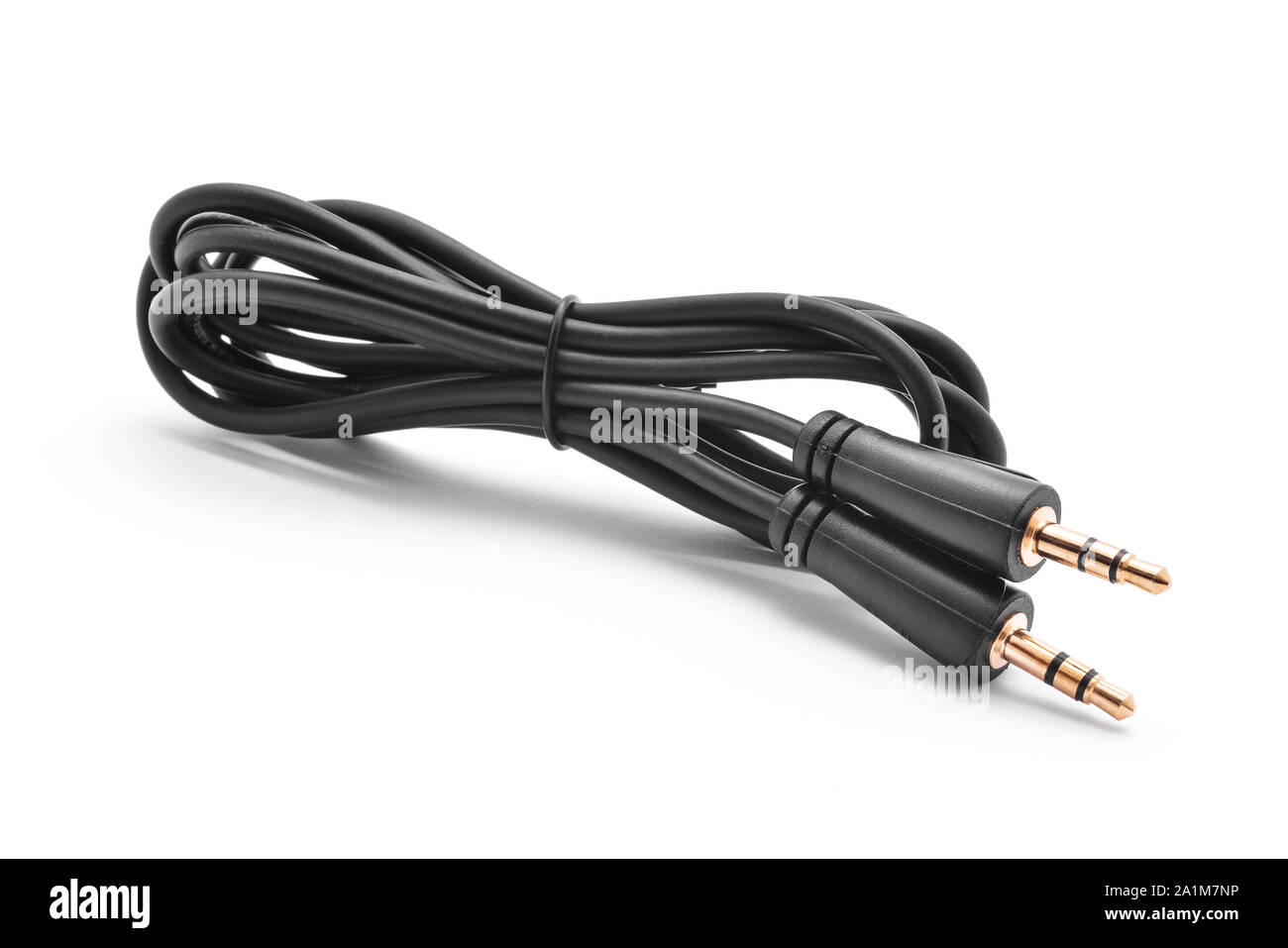 black 3.5 mm. jack audio cable on white background. Stock Photo