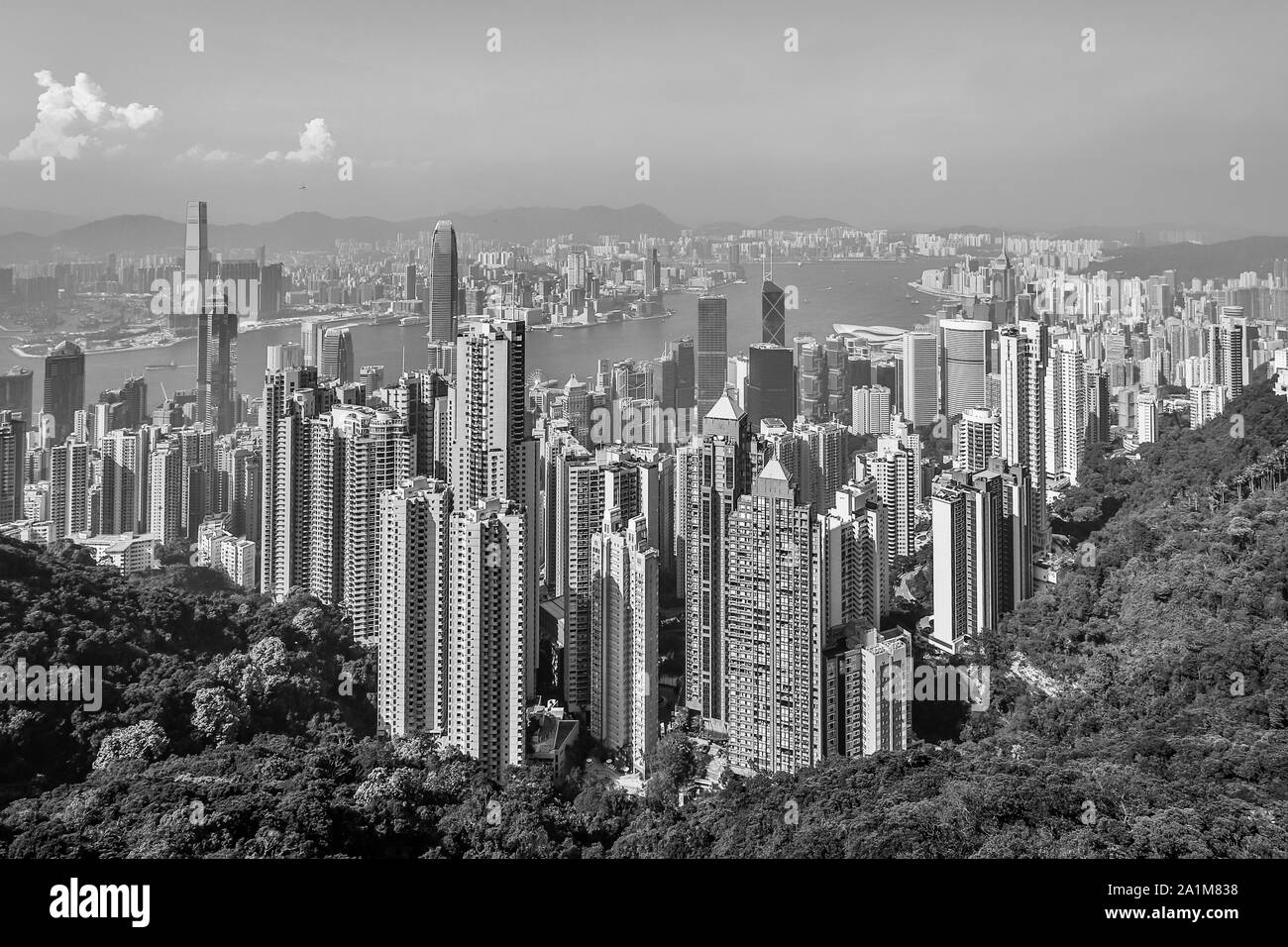 Panoramic view on Skyscrapers of Victoria Harbour and Hong Kong Bay. Taken from Victoria Peak Park on Hongkong Island. Hong Kong, China Stock Photo
