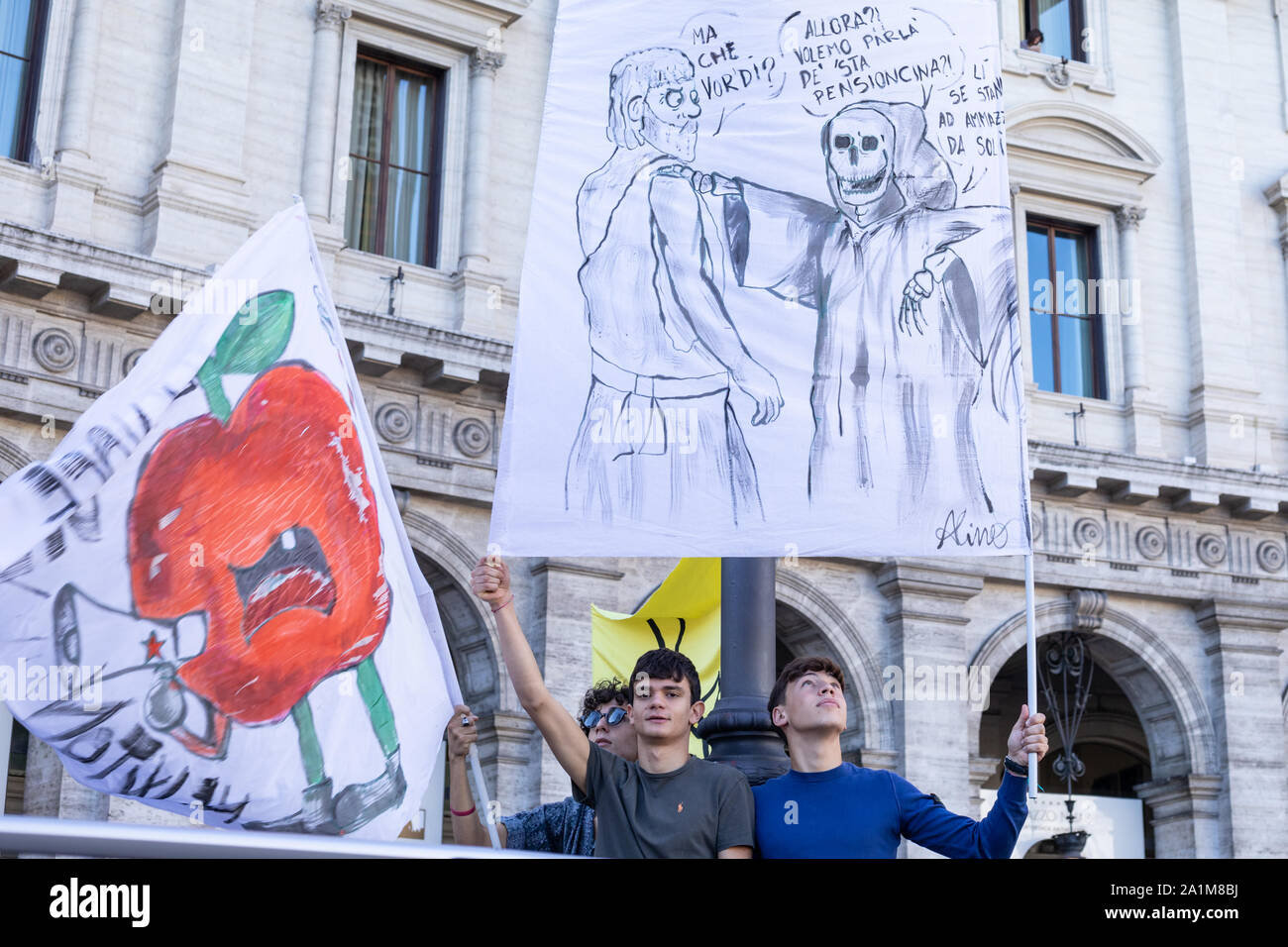 A banner showing death asking for retirement as he says 'they are killing themselves', during the protest.Friday for the future: an international demonstration of the earth that with great student participation started from Piazza della Repubblica to Piazza Madonna di Loreto (Piazza Venezia) in Rome. Stock Photo