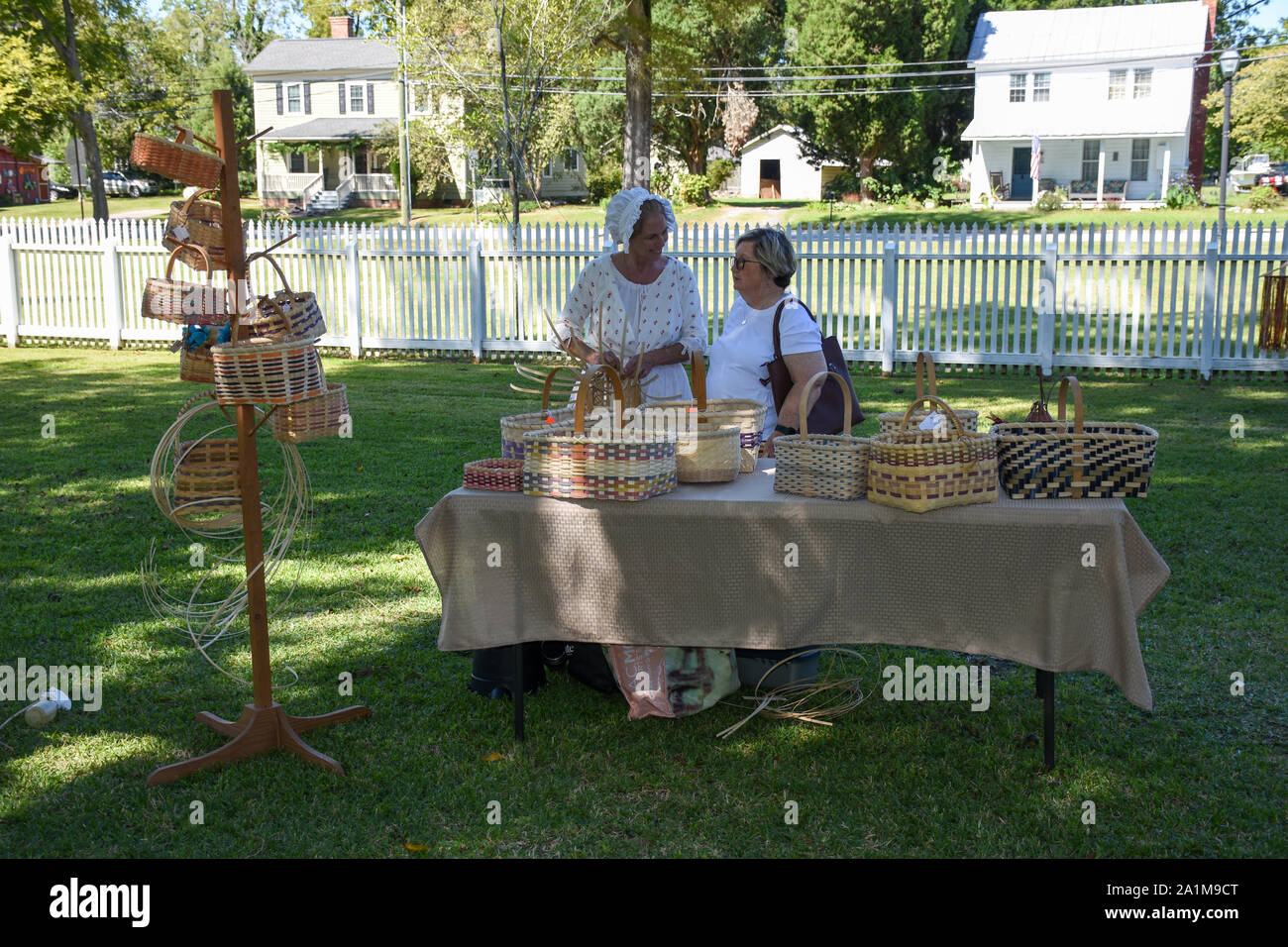A demonstration of basket making in colonial times. Stock Photo
